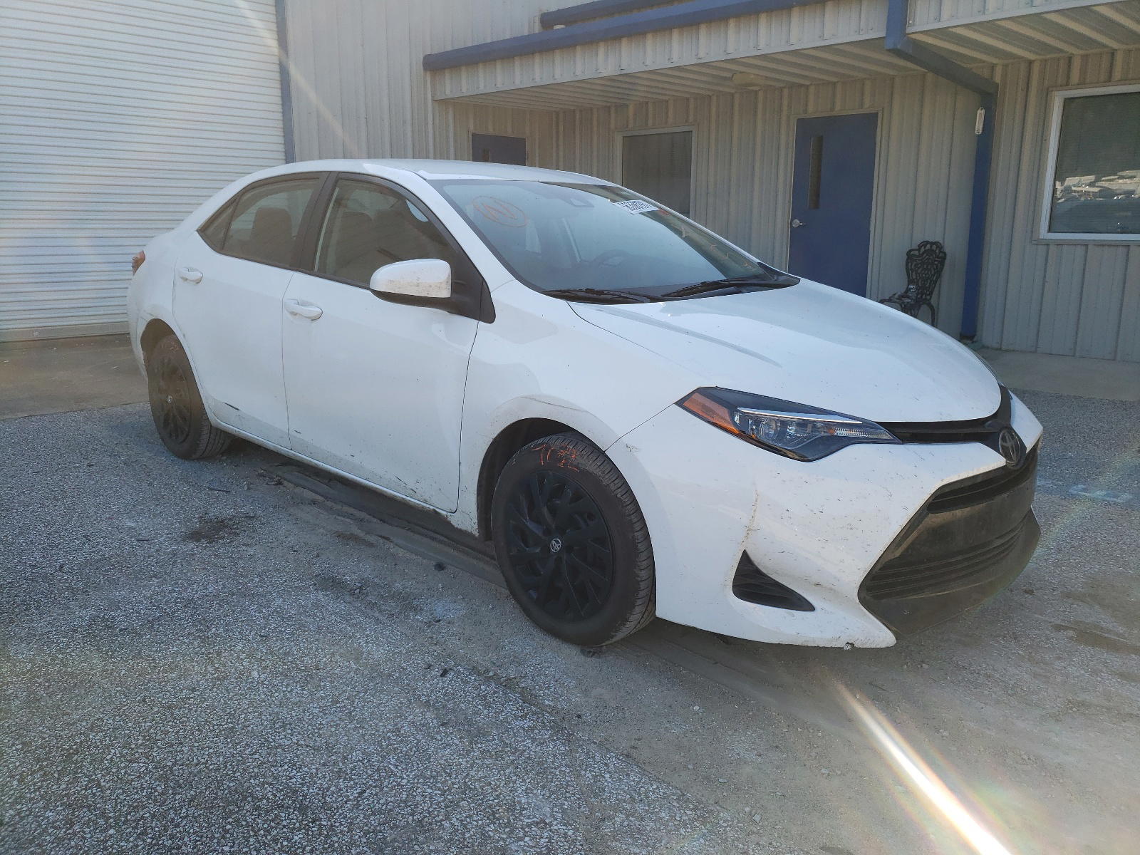 TOYOTA COROLLA L 2019 with VIN 2T1BURHEXKC214407 - Photo from auction