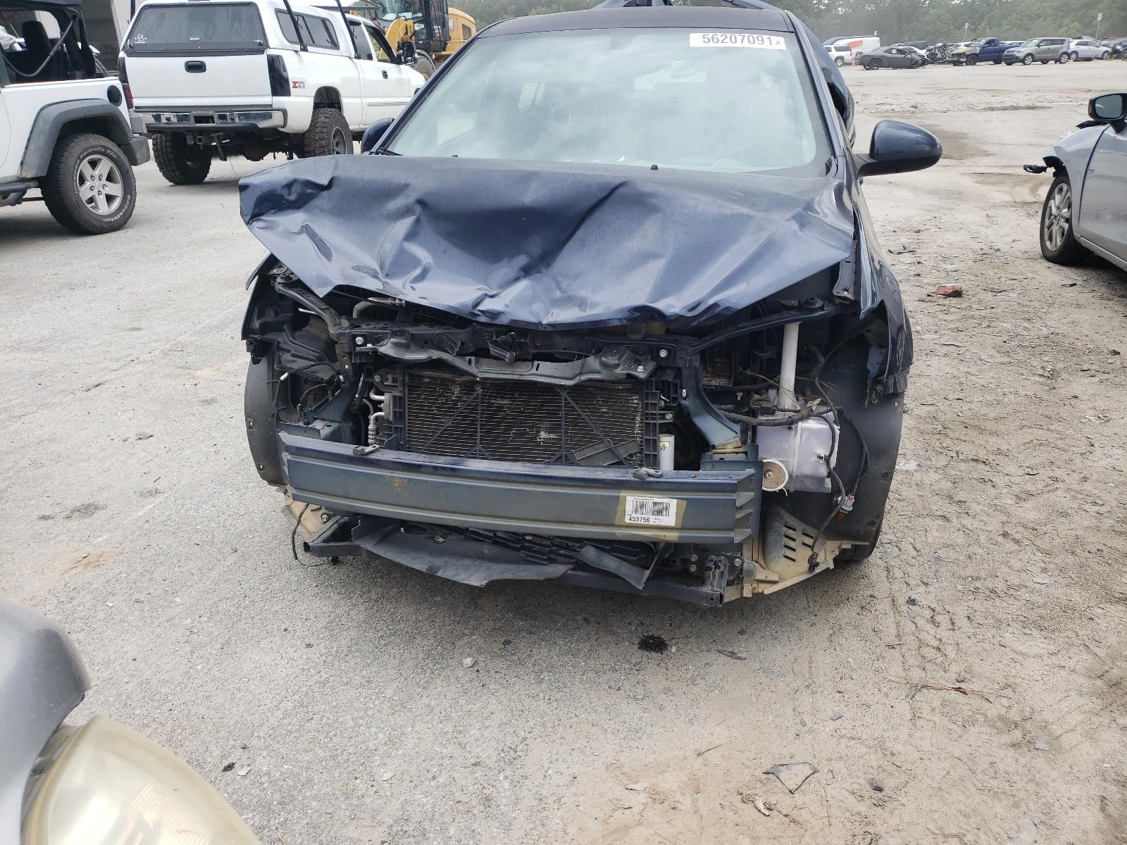 Photo 9 from auction – 2015 CHEVROLET SONIC LS with VIN 1G1JA5SH9F4115448