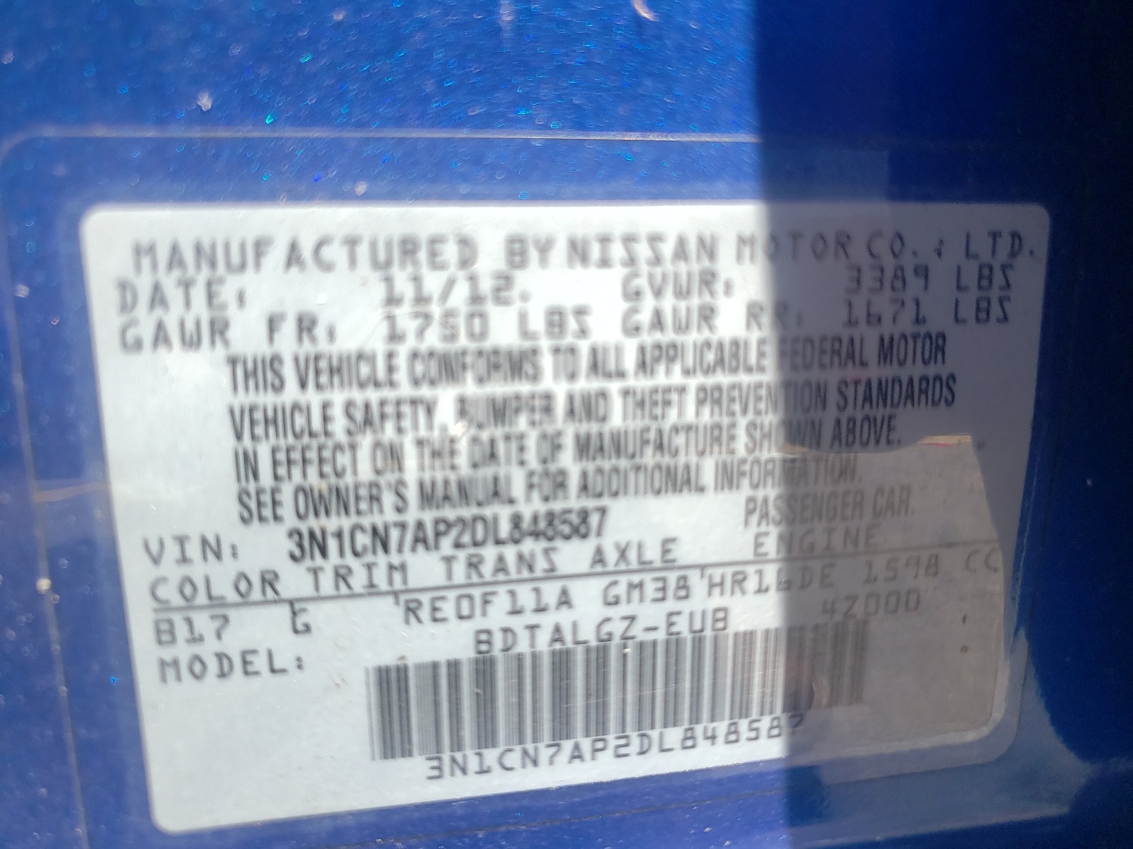 Photo 10 from auction – 2013 NISSAN VERSA S with VIN 3N1CN7AP2DL848587