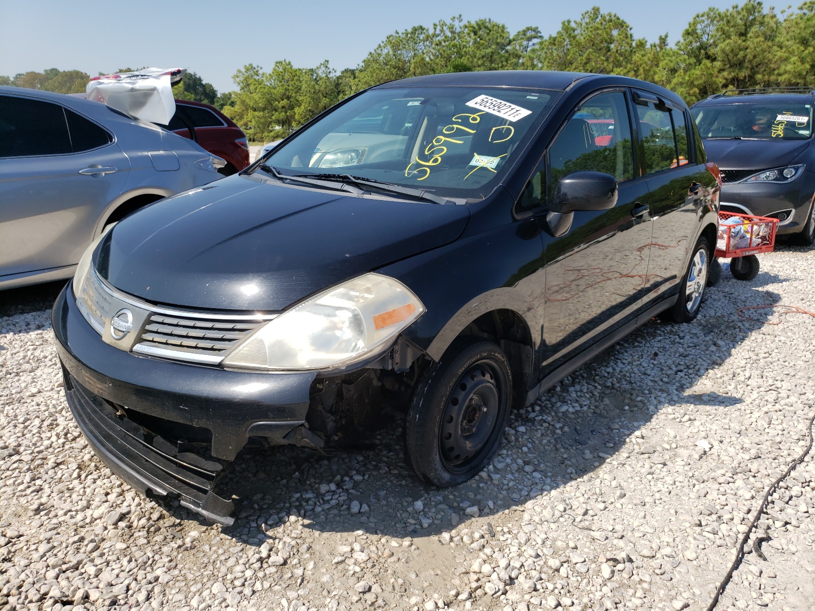 Photo 2 from auction – 2009 NISSAN VERSA S with VIN 3N1BC13E39L436860