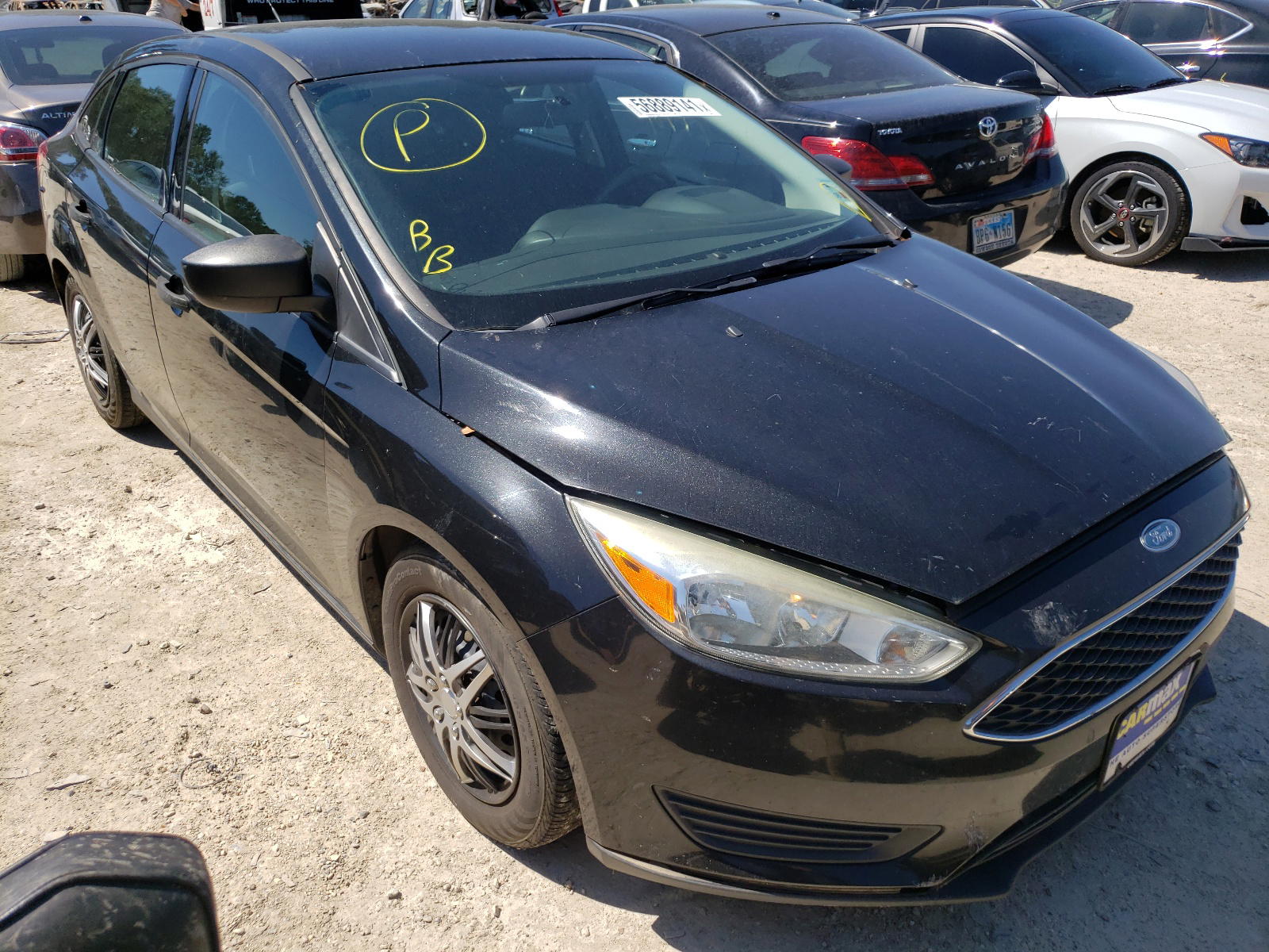 FORD FOCUS S 2015 with VIN 1FADP3E24FL299661 - Photo from auction