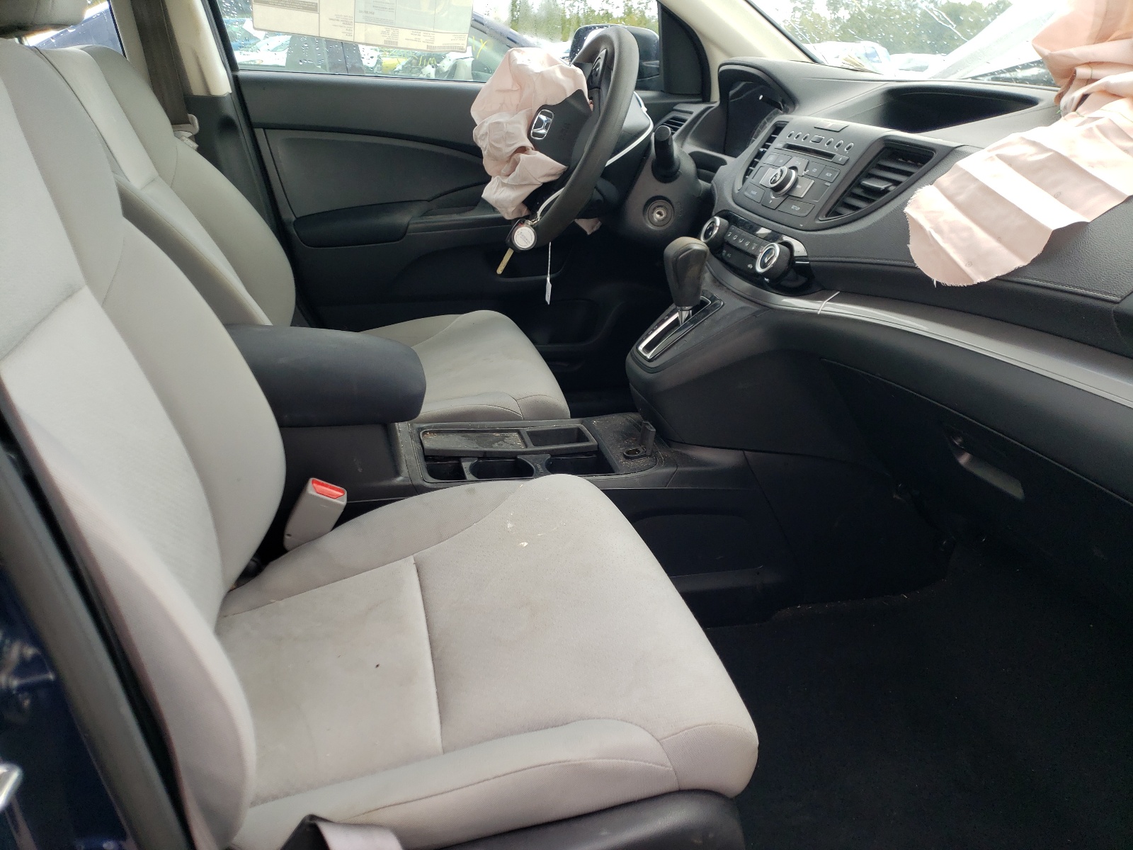 Photo 5 from auction – 2015 HONDA CR-V LX with VIN 2HKRM3H32FH554616