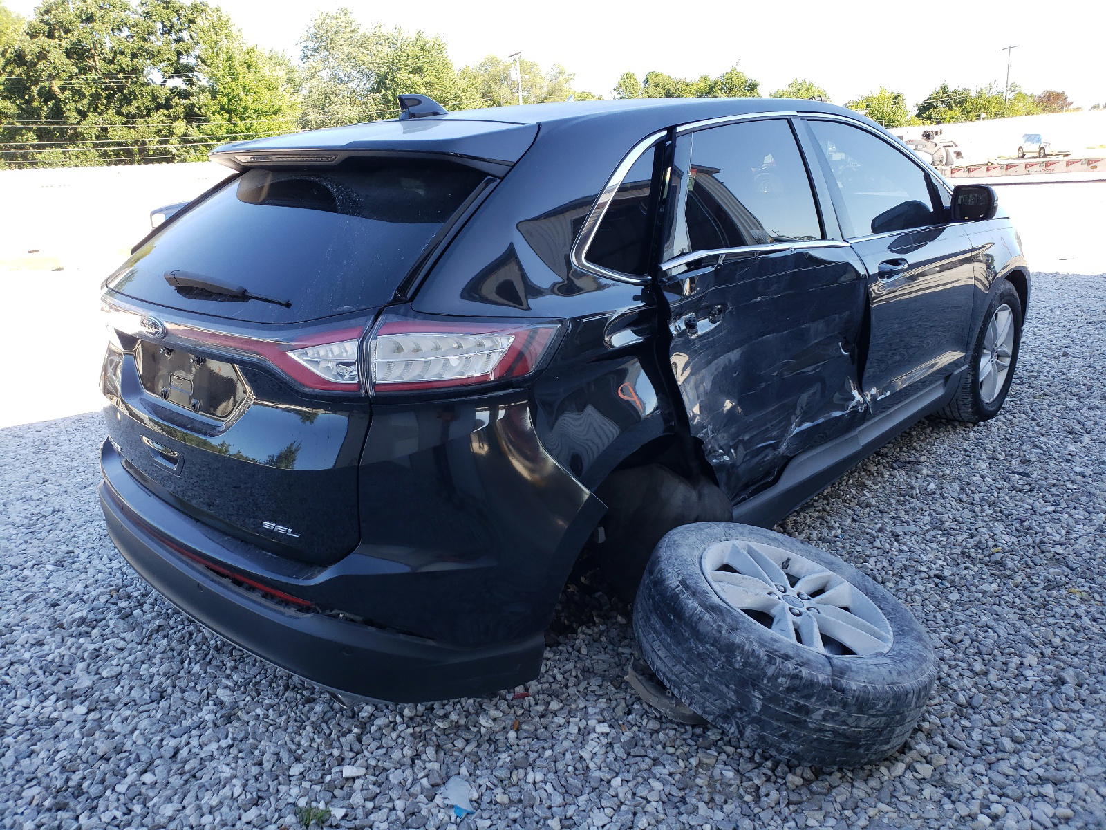 Photo 4 from auction – 2015 FORD EDGE SEL with VIN 2FMTK3J8XFBB32523