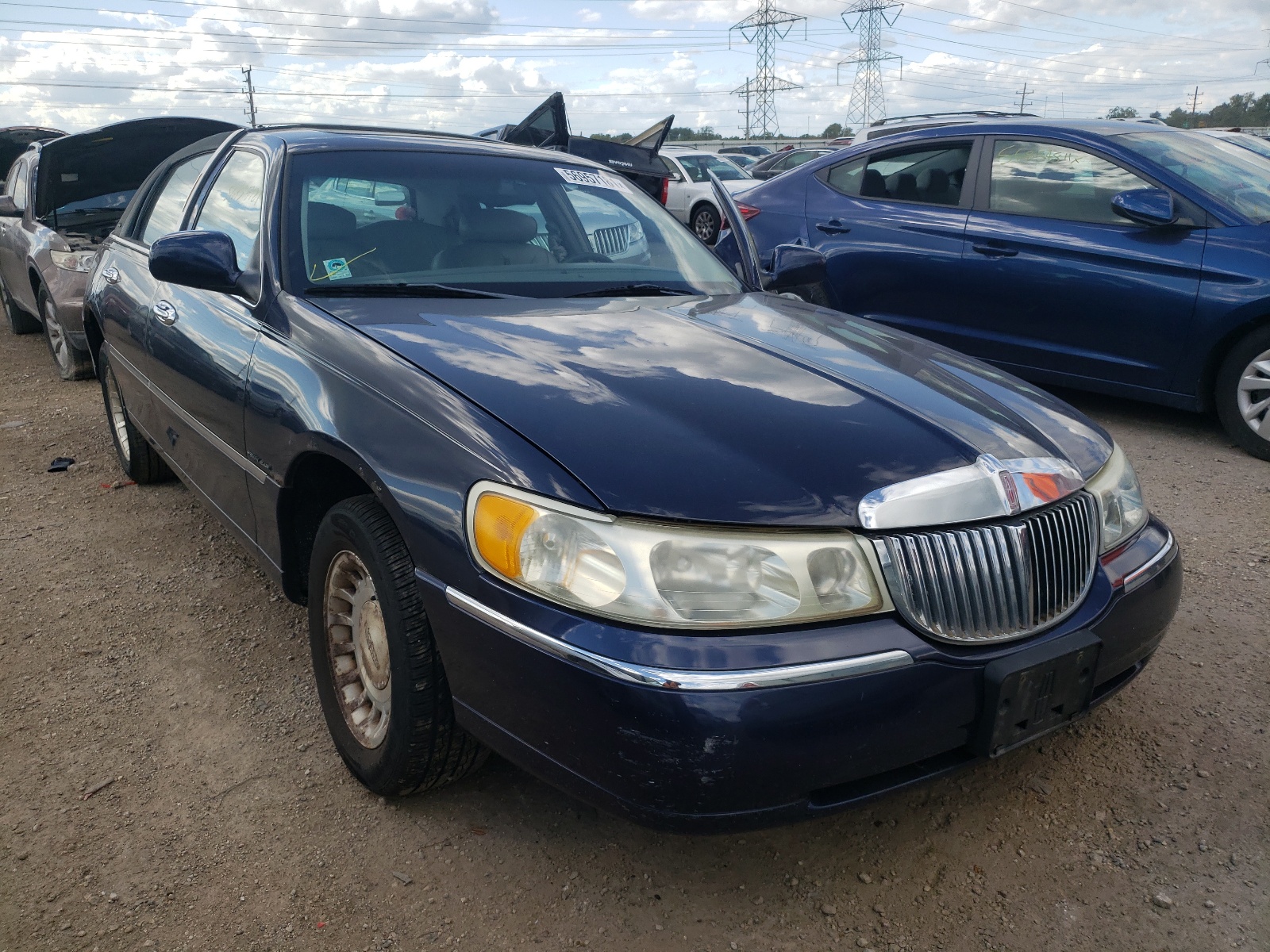 Photo 1 from auction – 2001 LINCOLN TOWN CAR E with VIN 1LNHM81W31Y712316