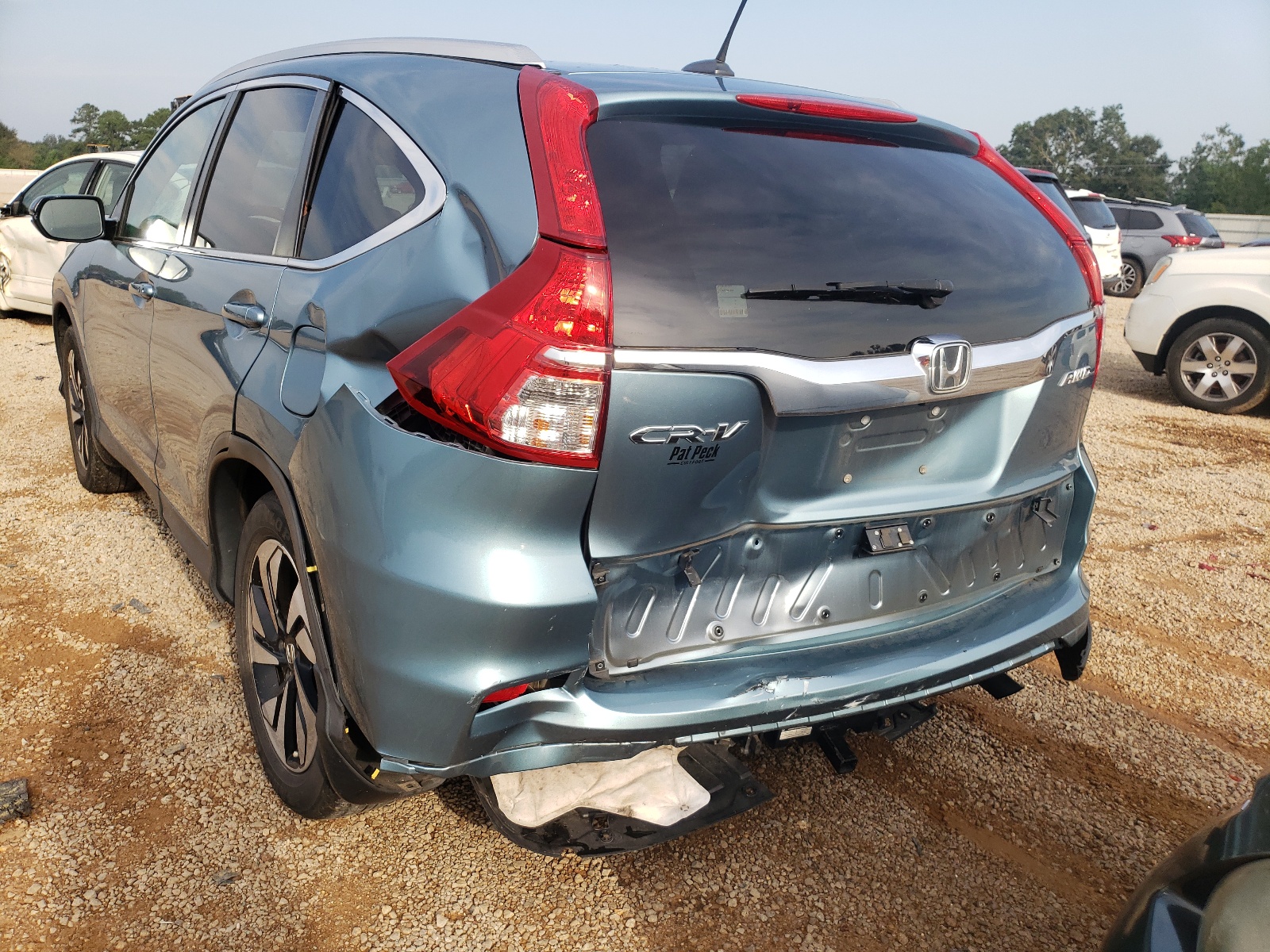 Photo 9 from auction – 2016 HONDA CR-V TOURI with VIN 5J6RM4H90GL013680