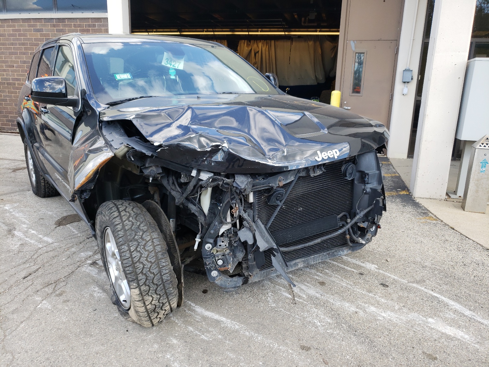 Photo 9 from auction – 2014 JEEP GRAND CHER with VIN 1C4RJFAG1EC470790