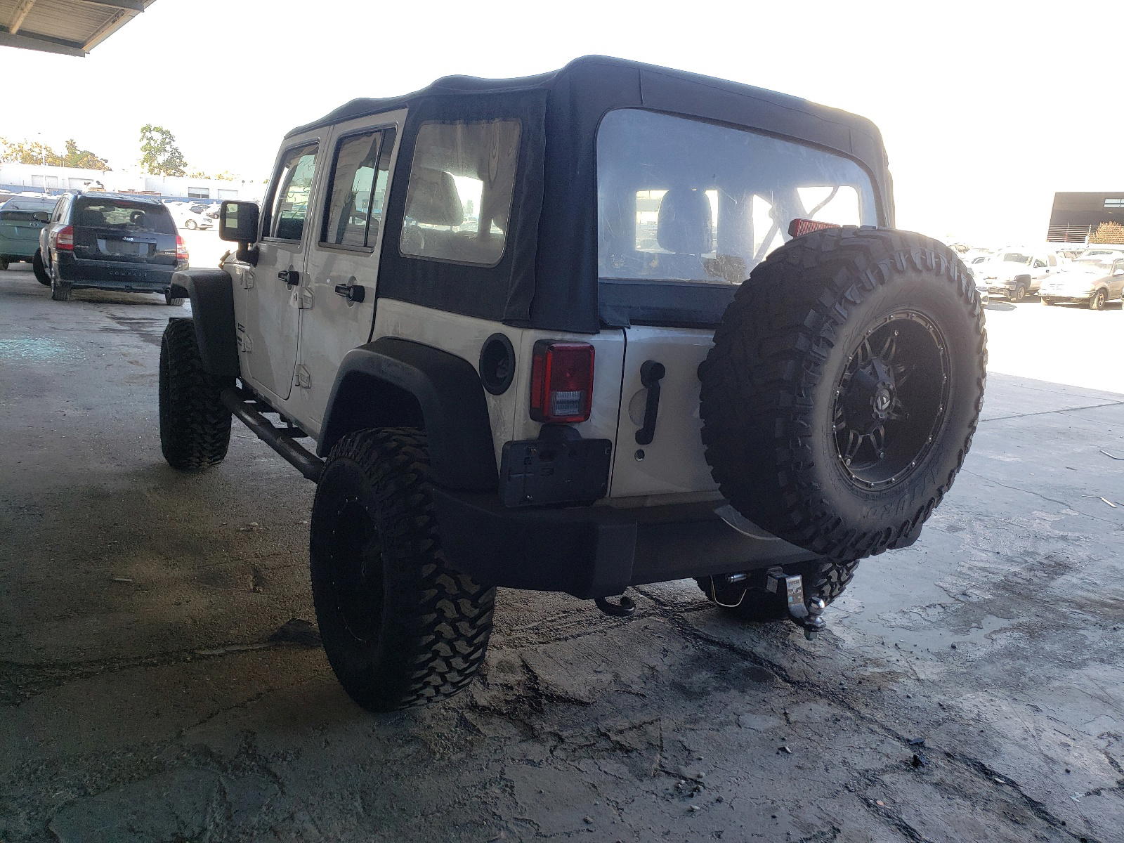 Photo 3 from auction – 2016 JEEP WRANGLER U with VIN 1C4BJWDG6GL144709