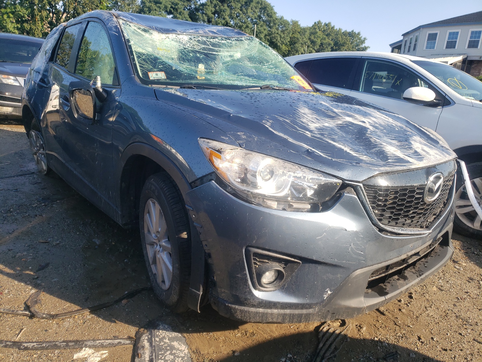 MAZDA CX-5 TOURI 2015 with VIN JM3KE4CYXF0475299 - Photo from auction