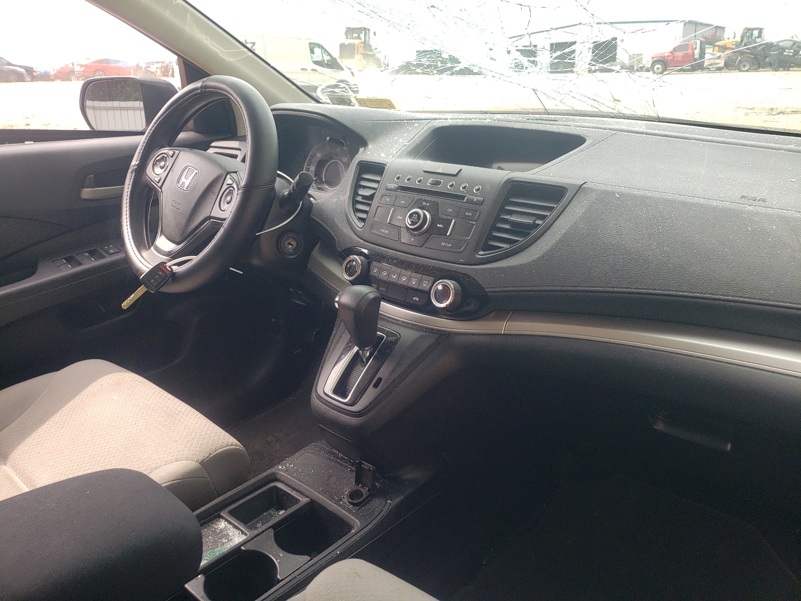 Photo 9 from auction – 2016 HONDA CR-V LX with VIN 5J6RM4H31GL129238