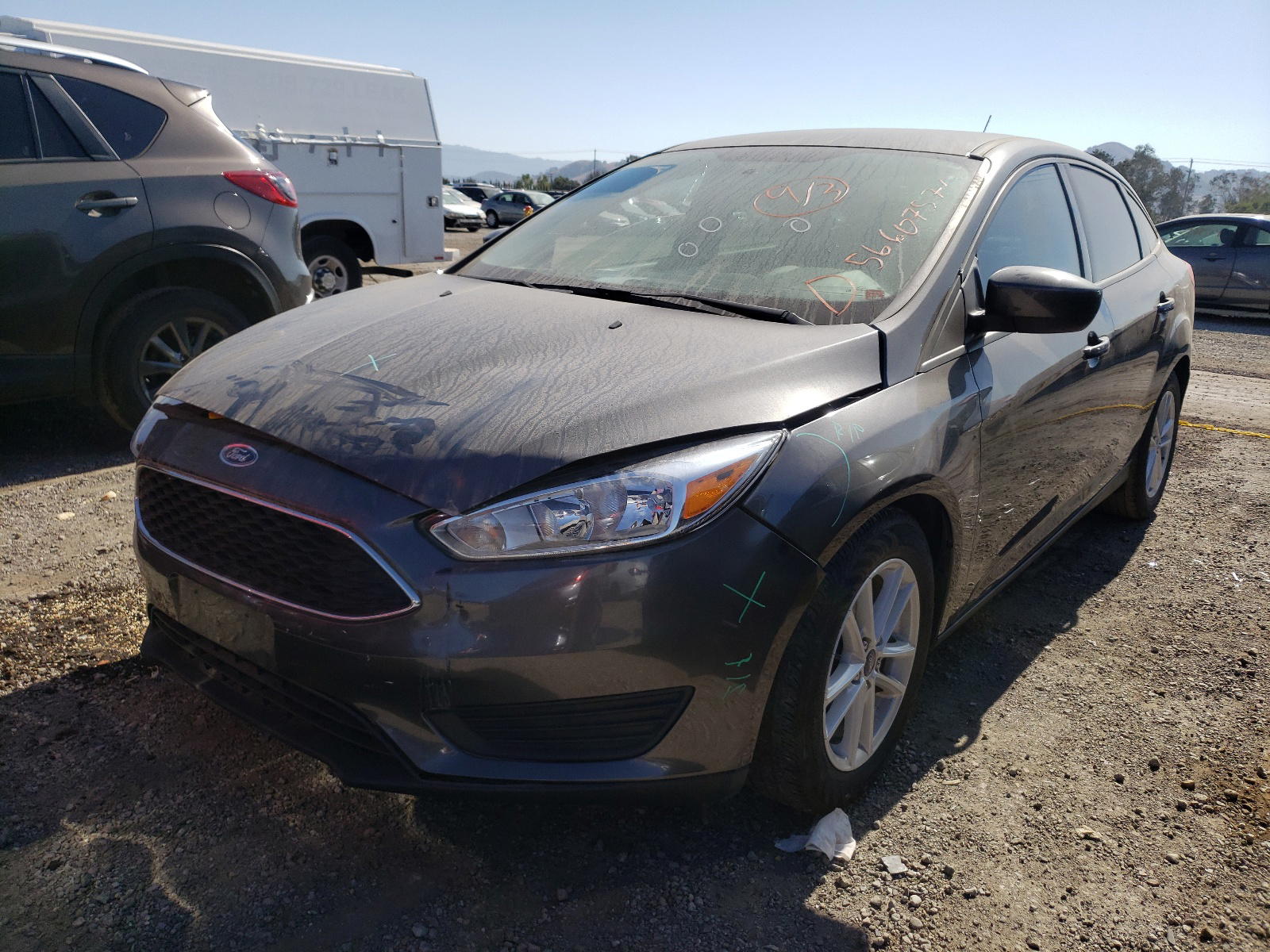 Photo 2 from auction – 2018 FORD FOCUS SE with VIN 1FADP3F24JL205723