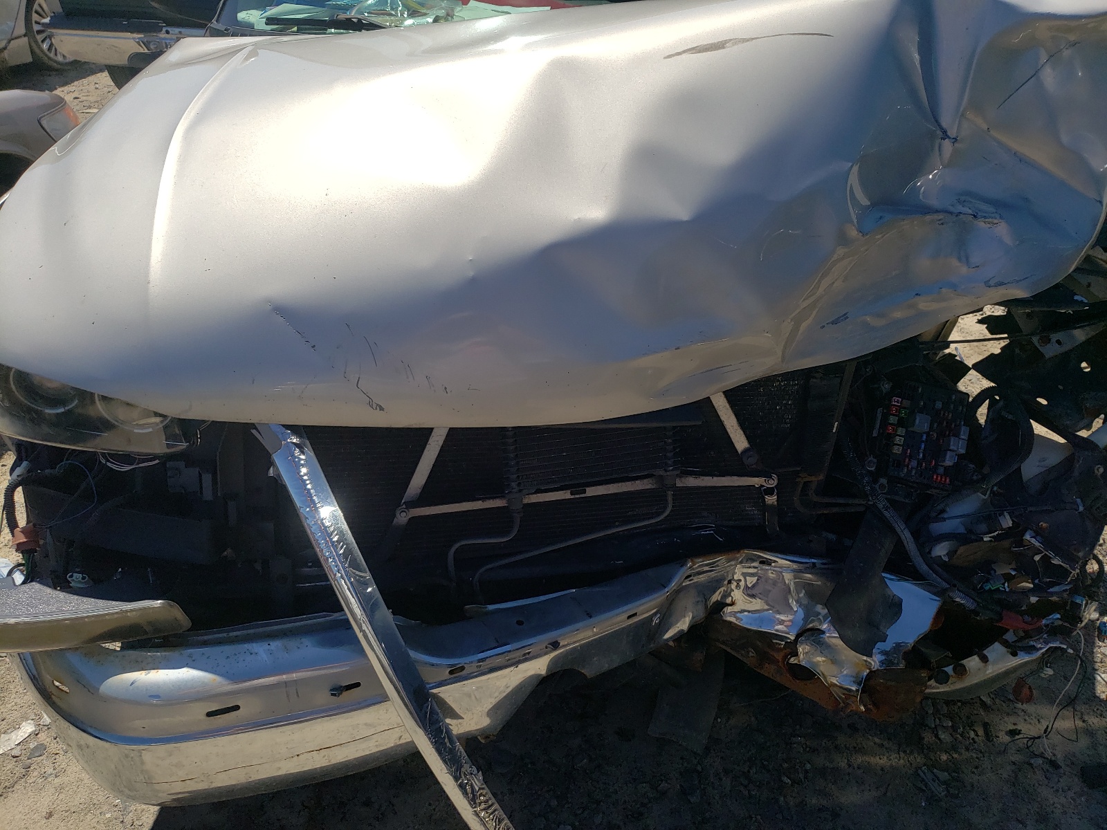 Photo 7 from auction – 2004 GMC YUKON with VIN 1GKEC13V84R162894