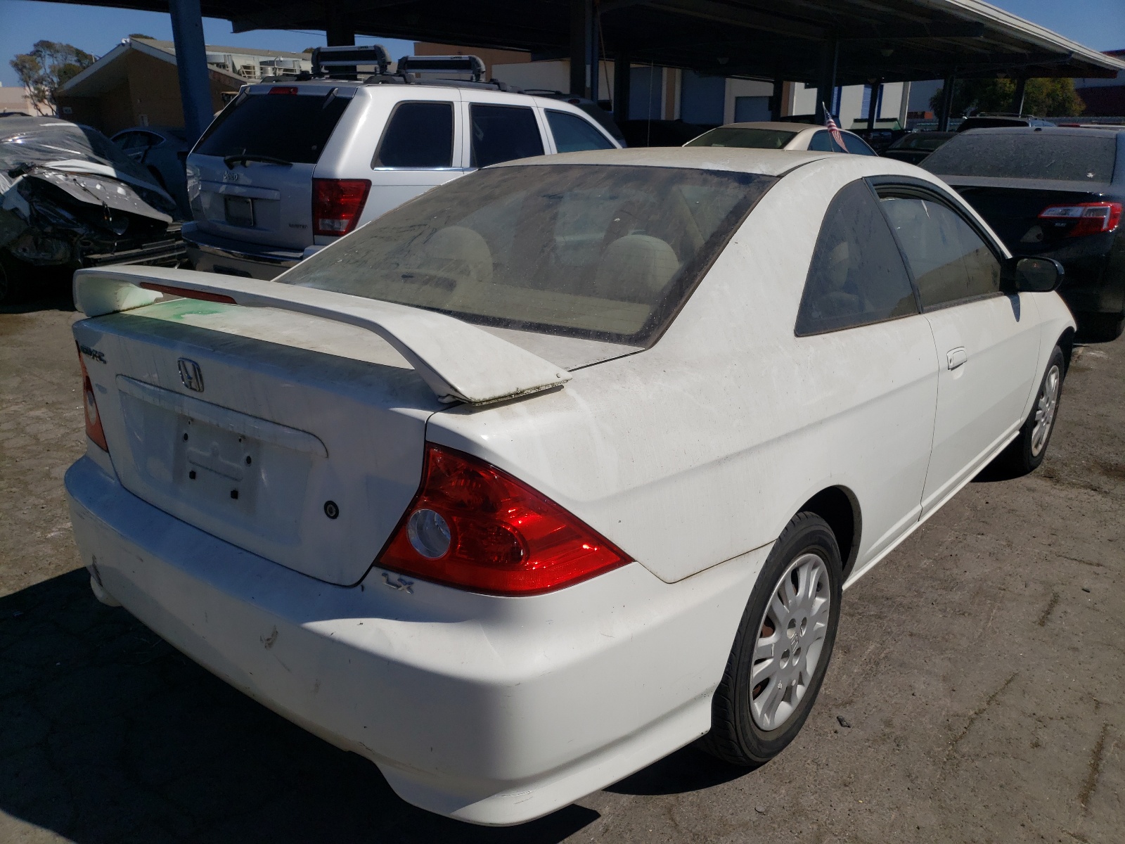 Photo 4 from auction – 2004 HONDA CIVIC LX with VIN 1HGEM22574L029905
