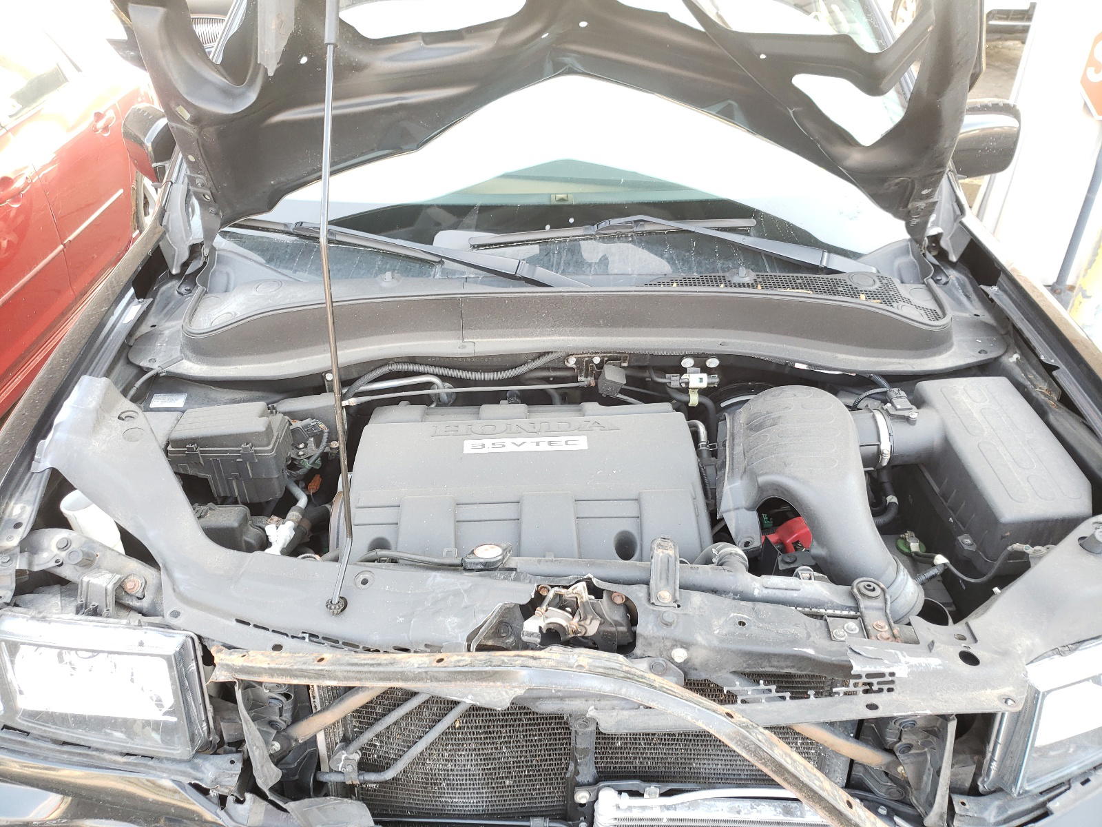 Photo 7 from auction – 2014 HONDA RIDGELINE with VIN 5FPYK1F61EB005786