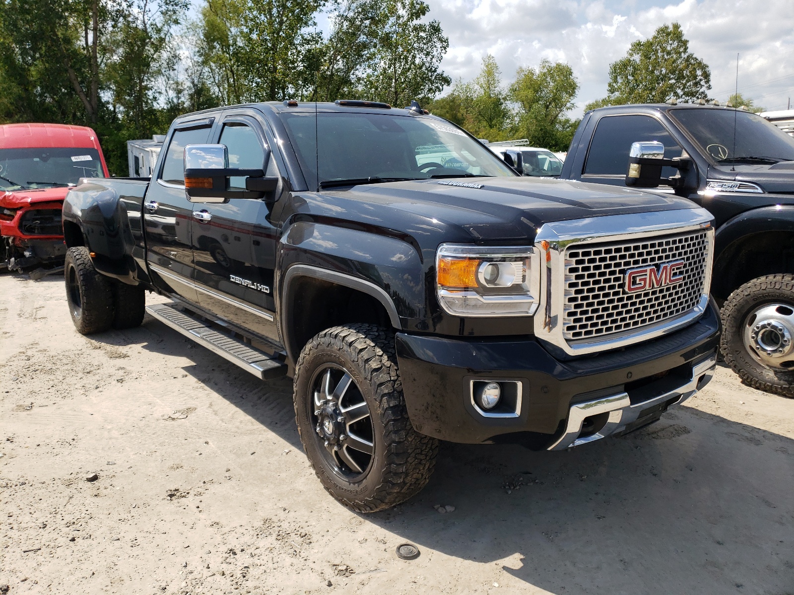 Photo 1 from auction – 2016 GMC SIERRA K35 with VIN 1GT42YE88GF256029