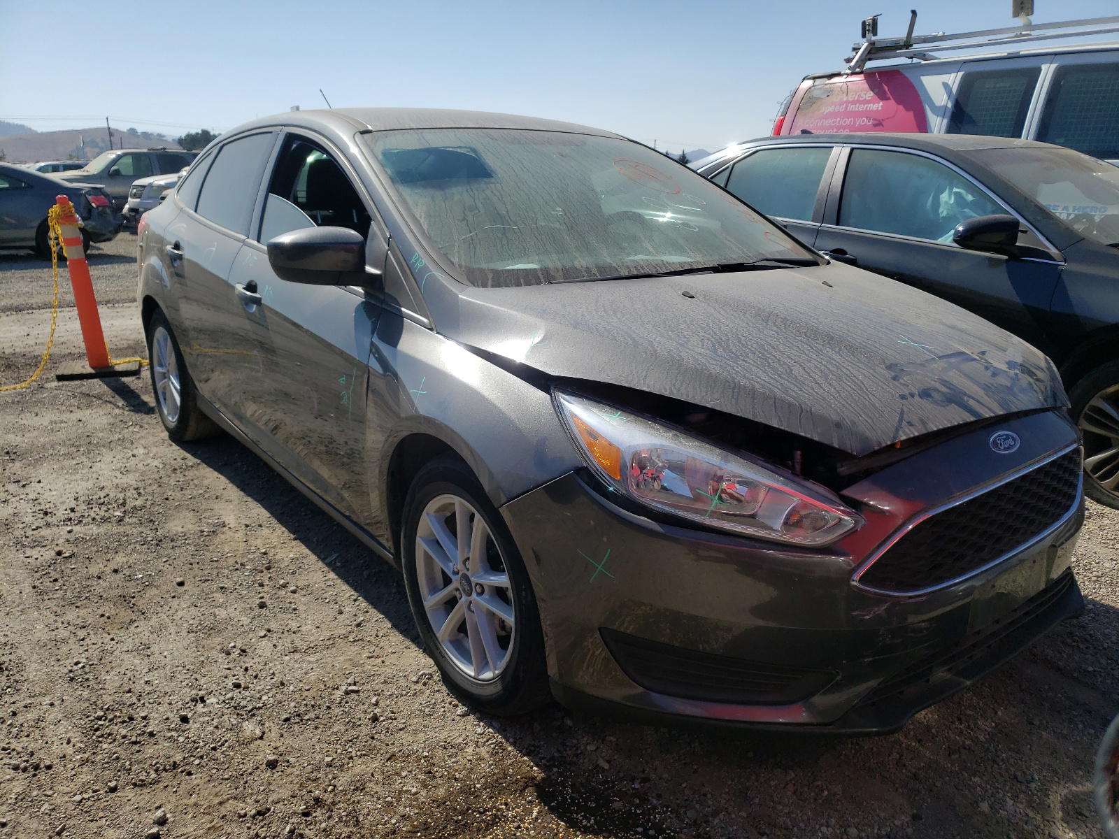 FORD FOCUS SE 2018 with VIN 1FADP3F24JL205723 - Photo from auction