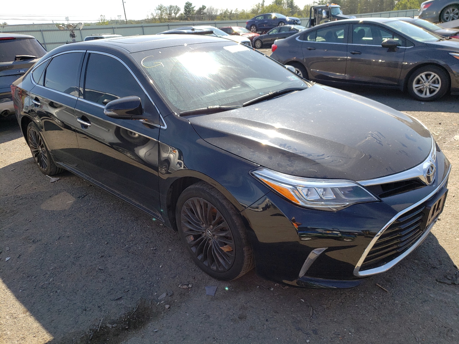 TOYOTA AVALON XLE 2016 with VIN 4T1BK1EB6GU201158 - Photo from auction