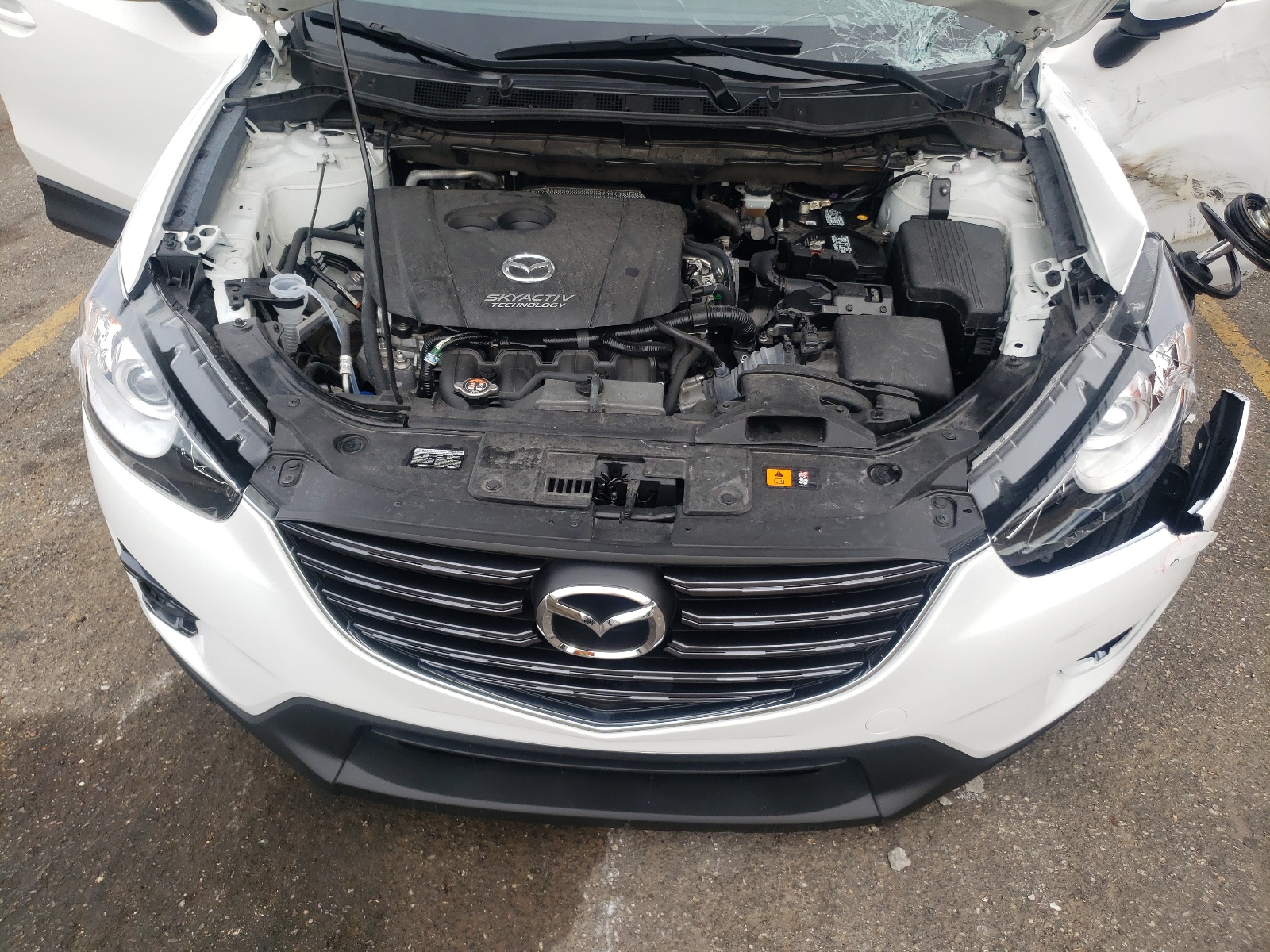Photo 7 from auction – 2016 MAZDA CX-5 TOURI with VIN JM3KE2CYXG0870492