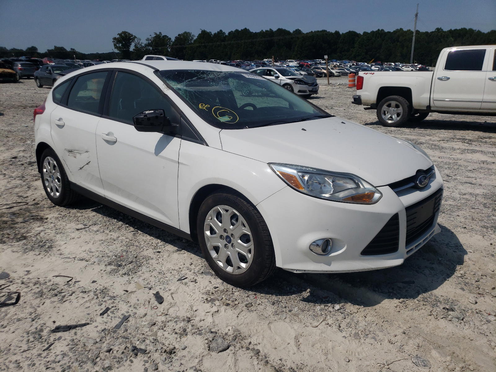 FORD FOCUS SE 2012 with VIN 1FAHP3K26CL221559 - Photo from auction