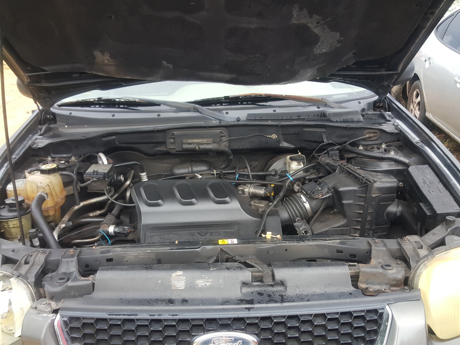 Photo 7 from auction – 2004 FORD ESCAPE XLT with VIN 1FMYU93174KB68126