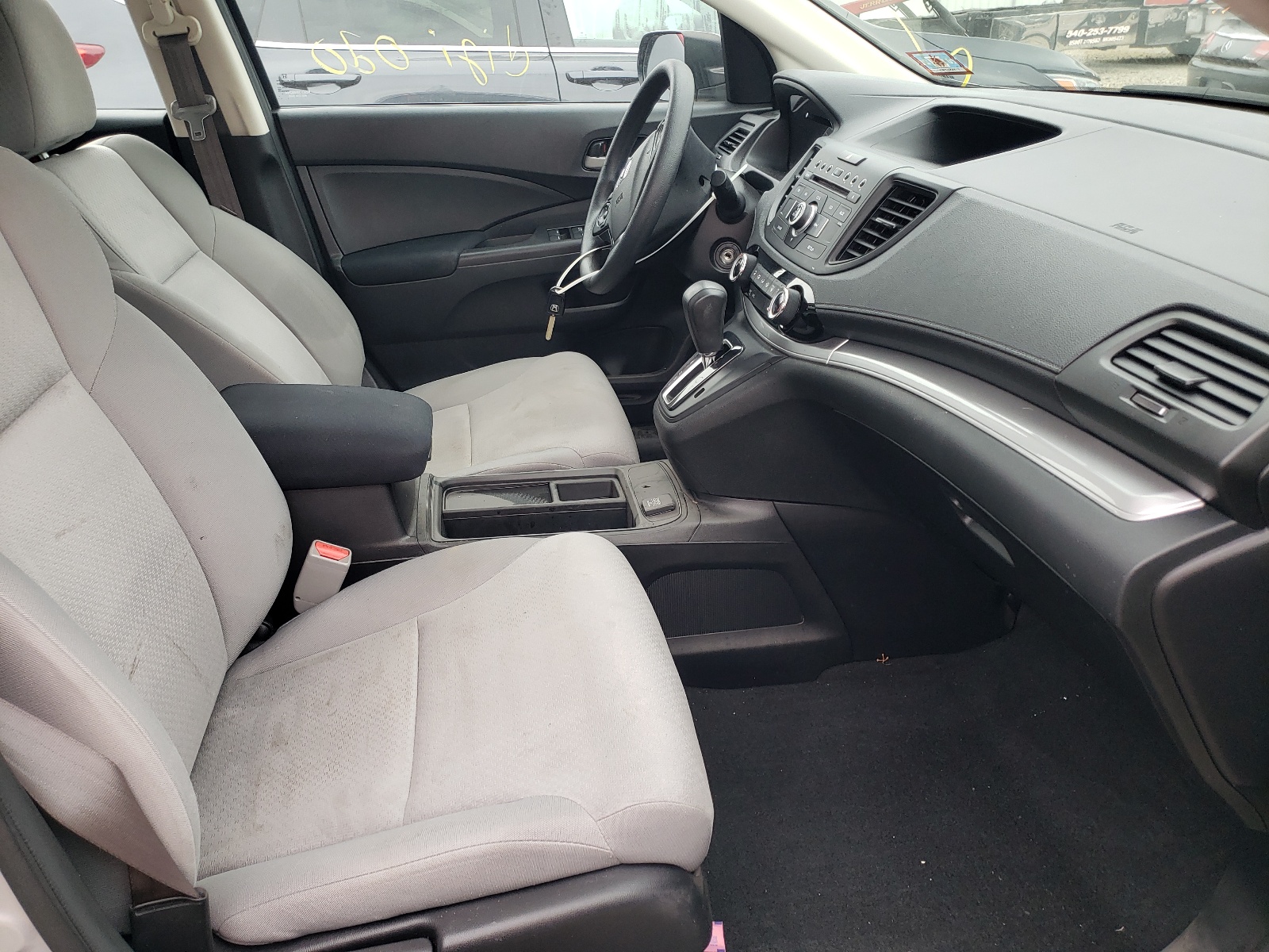 Photo 5 from auction – 2015 HONDA CR-V LX with VIN 2HKRM4H34FH696536