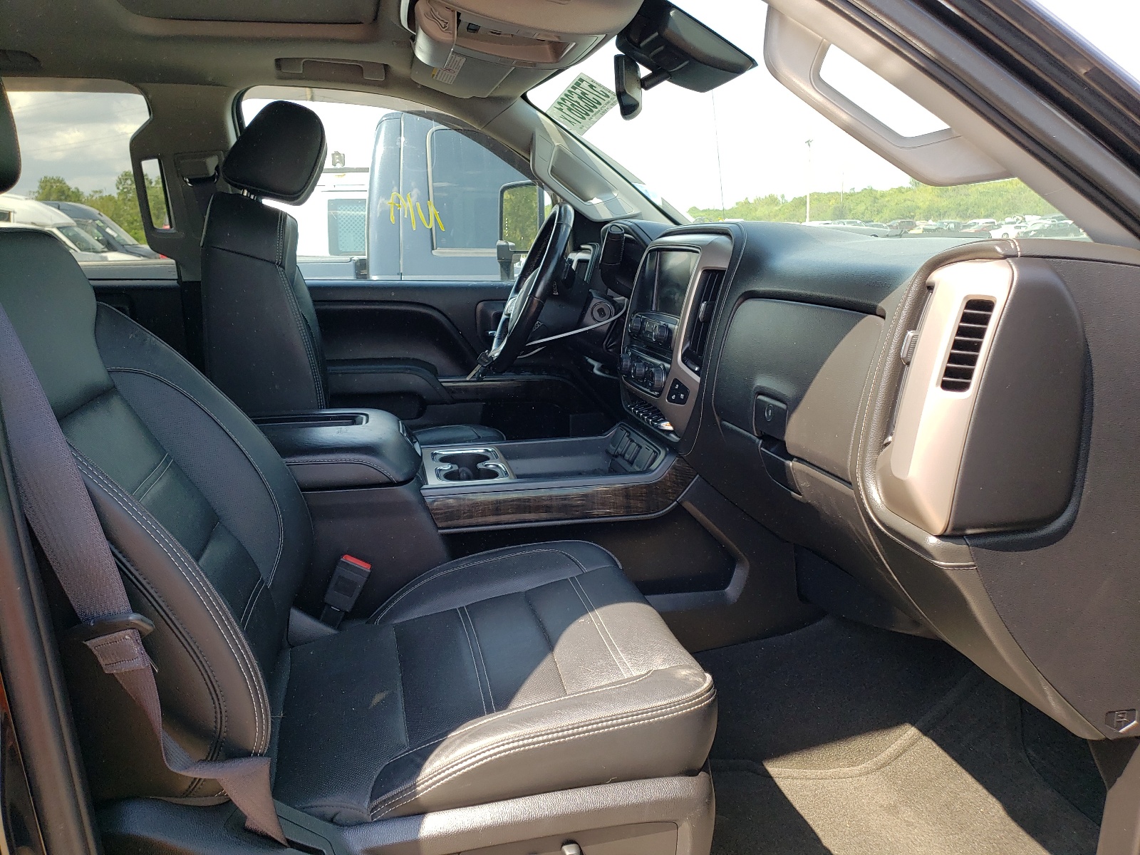 Photo 5 from auction – 2016 GMC SIERRA K35 with VIN 1GT42YE88GF256029