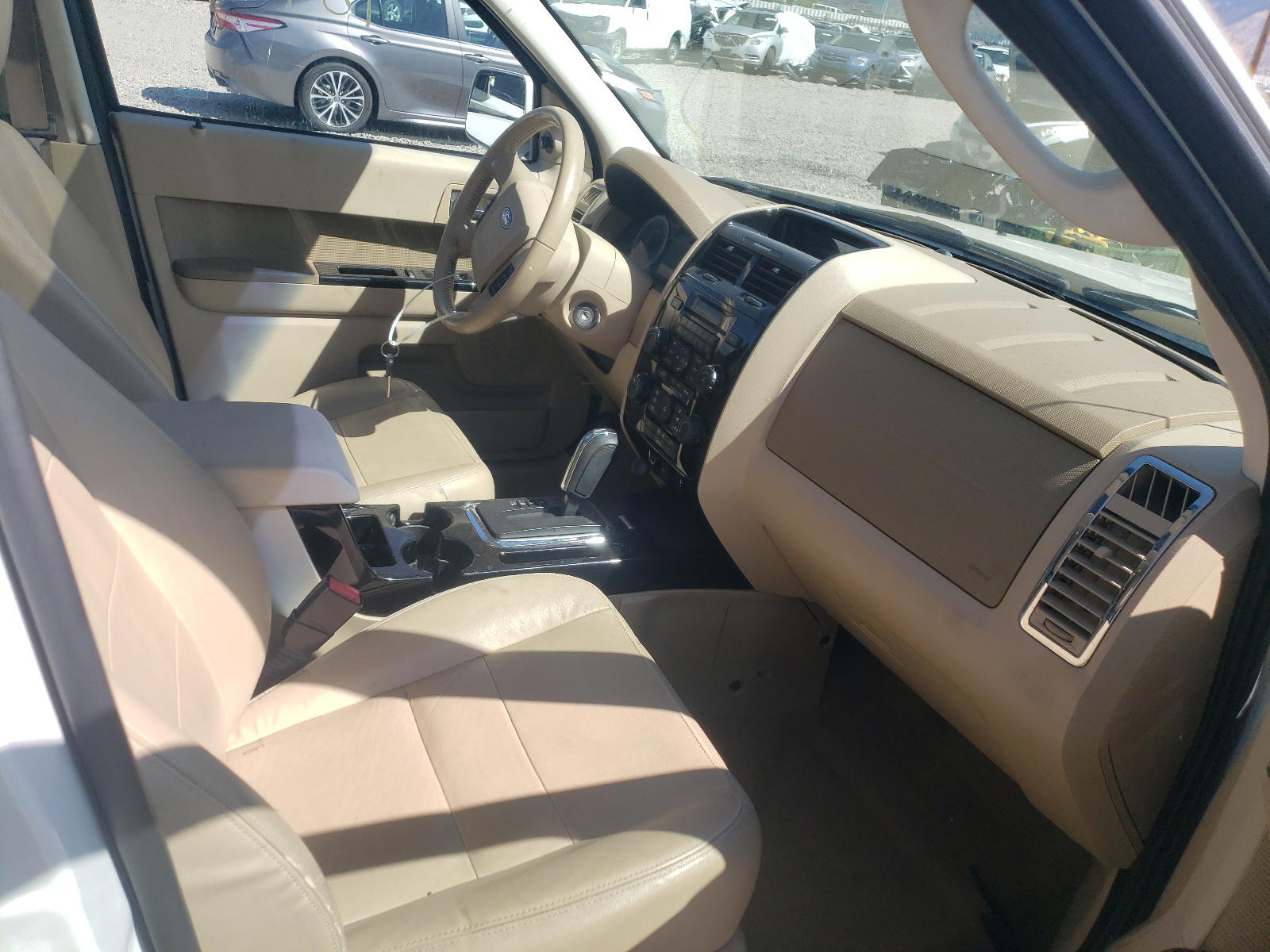 Photo 5 from auction – 2011 FORD ESCAPE LIM with VIN 1FMCU9E76BKA57396