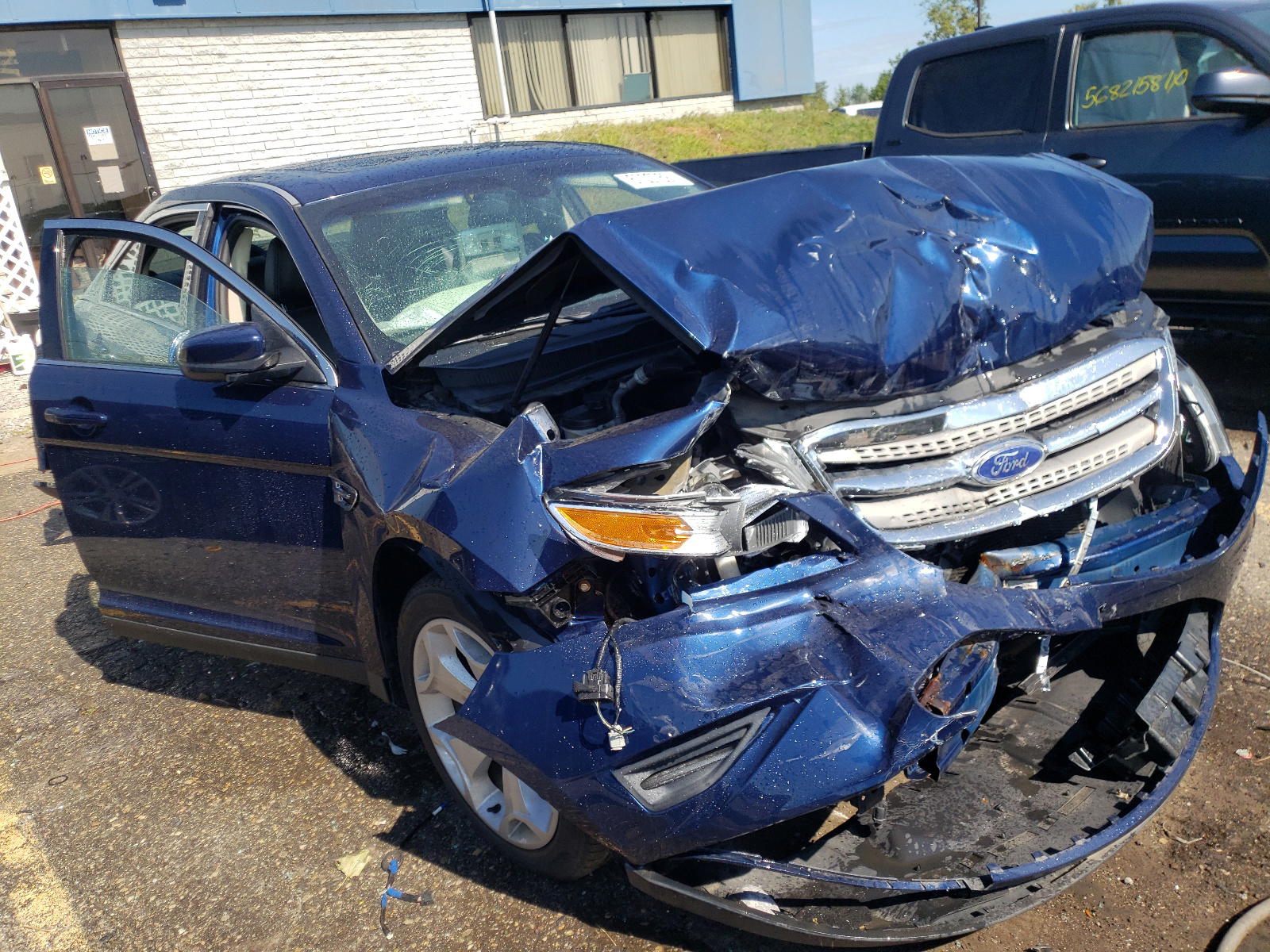 FORD TAURUS SEL 2012 with VIN 1FAHP2EW7CG110813 - Photo from auction