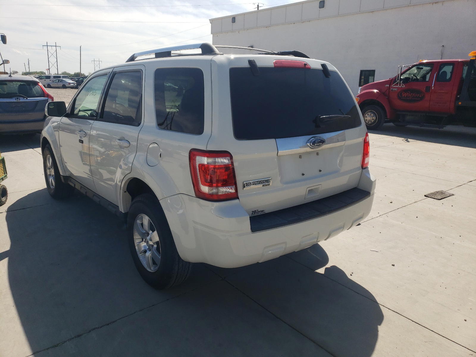 Photo 3 from auction – 2011 FORD ESCAPE LIM with VIN 1FMCU9E76BKA57396