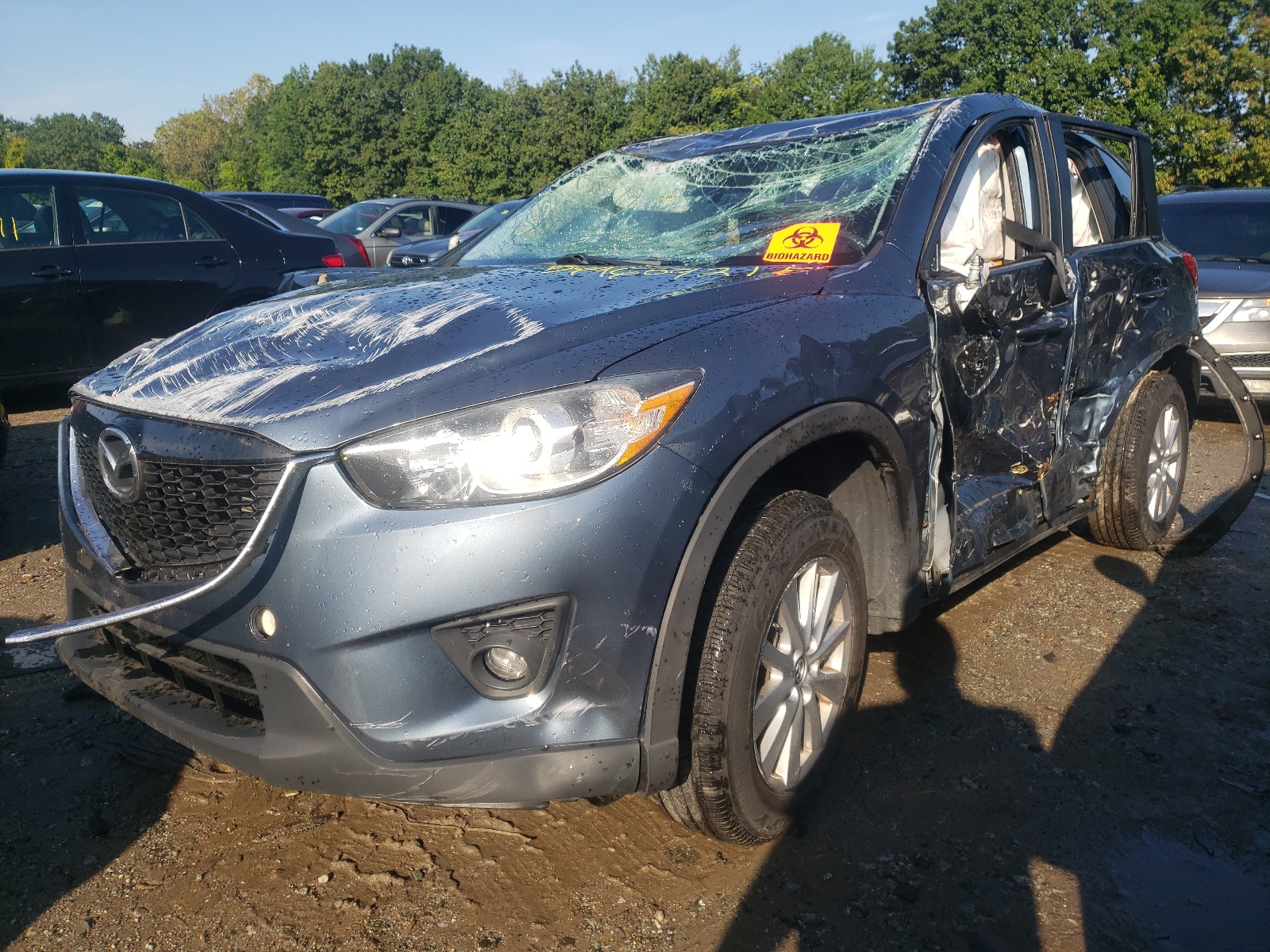 Photo 2 from auction – 2015 MAZDA CX-5 TOURI with VIN JM3KE4CYXF0475299
