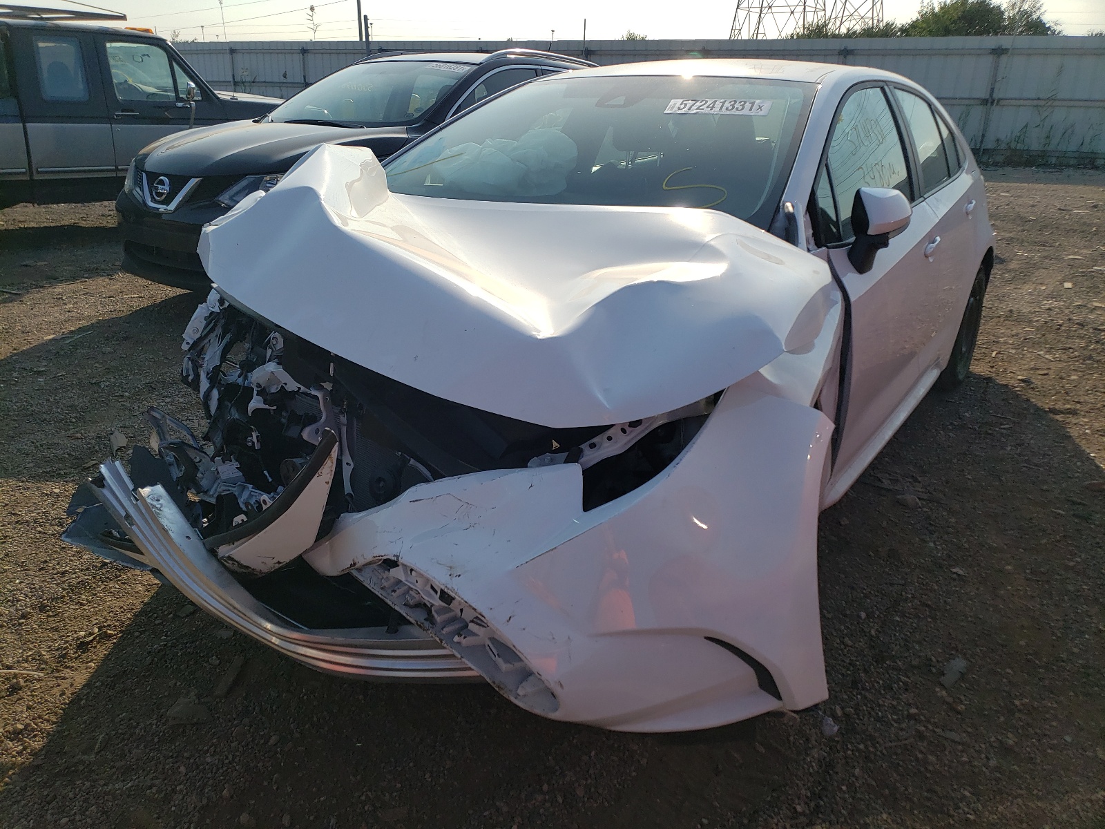 Photo 2 from auction – 2021 TOYOTA COROLLA LE with VIN 5YFEPMAE5MP216683
