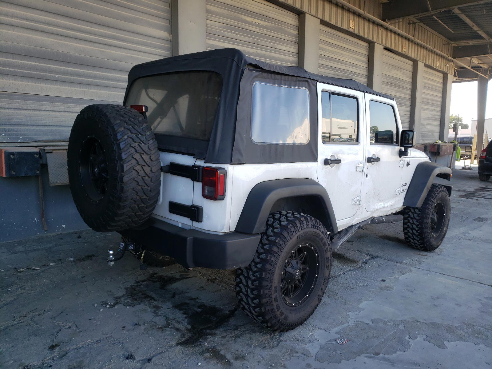 Photo 4 from auction – 2016 JEEP WRANGLER U with VIN 1C4BJWDG6GL144709