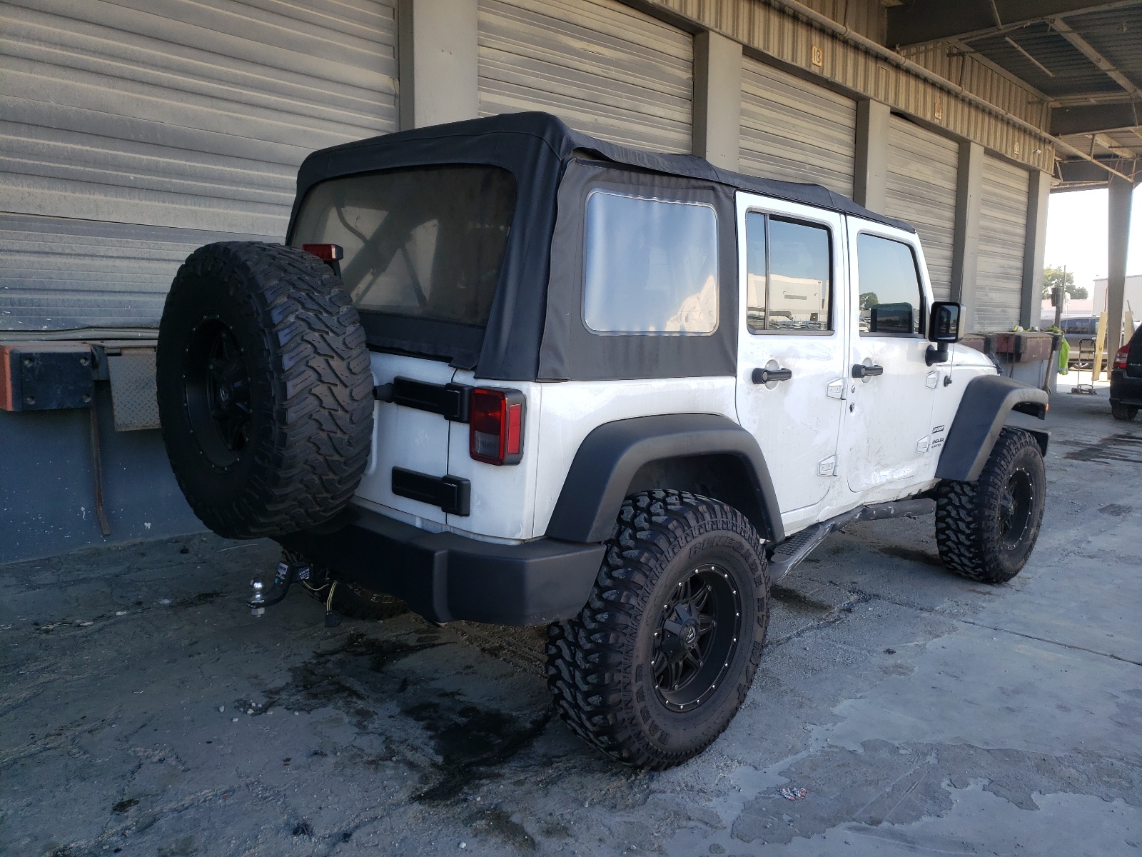 Zdjęcie 4 z aukcji – 2016 JEEP WRANGLER U z VIN 1C4BJWDG6GL144709