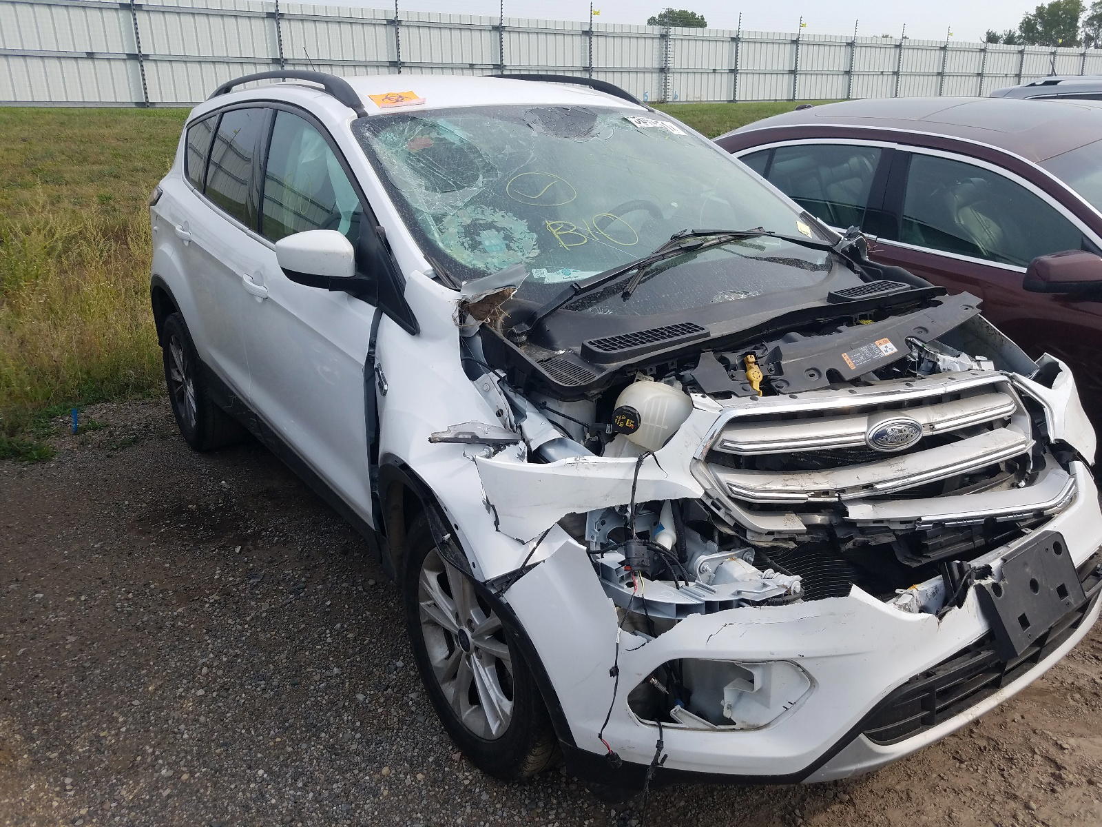 FORD ESCAPE SE 2018 with VIN 1FMCU0GD6JUC89000 - Photo from auction
