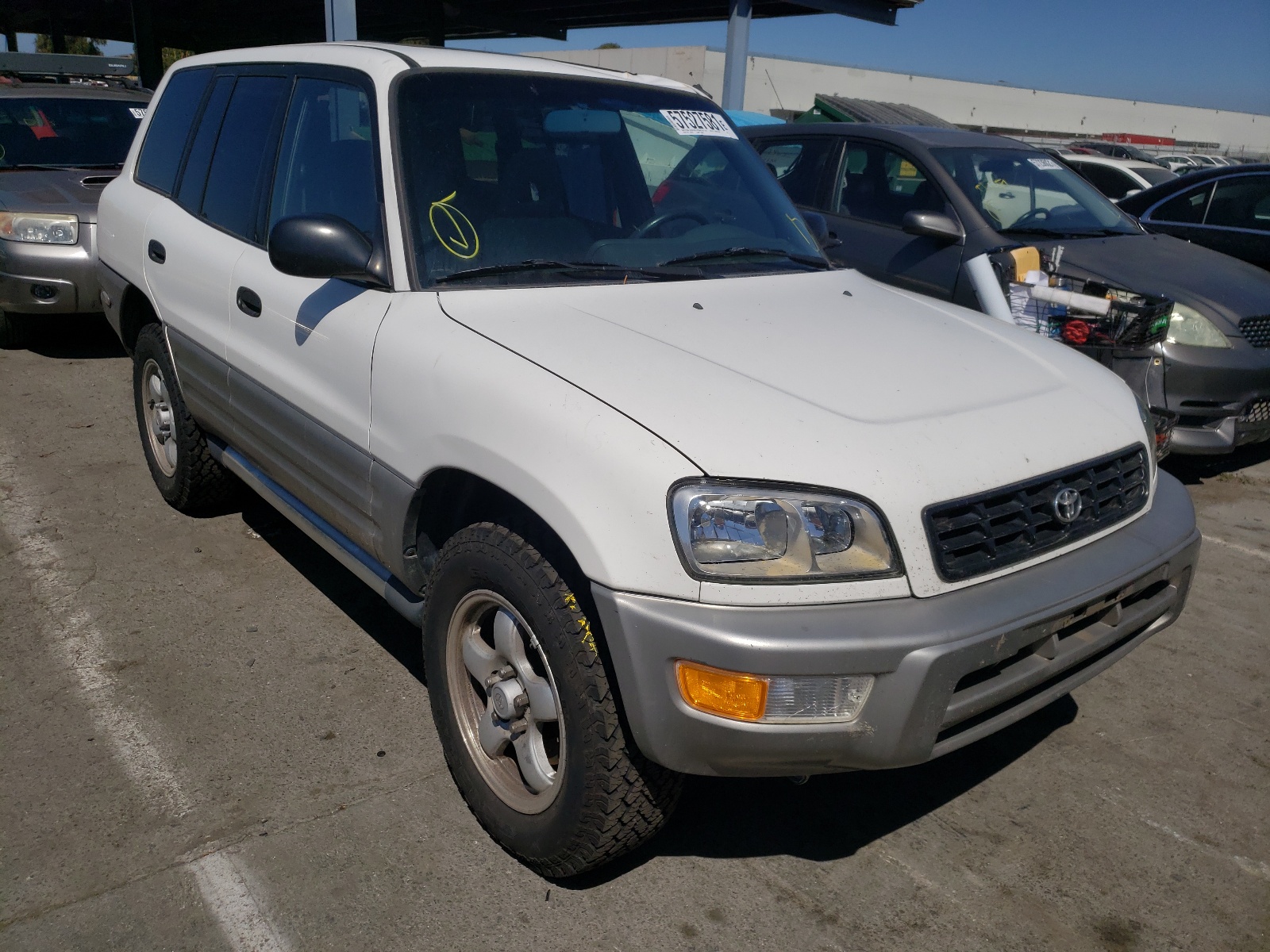 TOYOTA RAV4 1998 with VIN JT3GP10V5W0030670 - Photo from auction