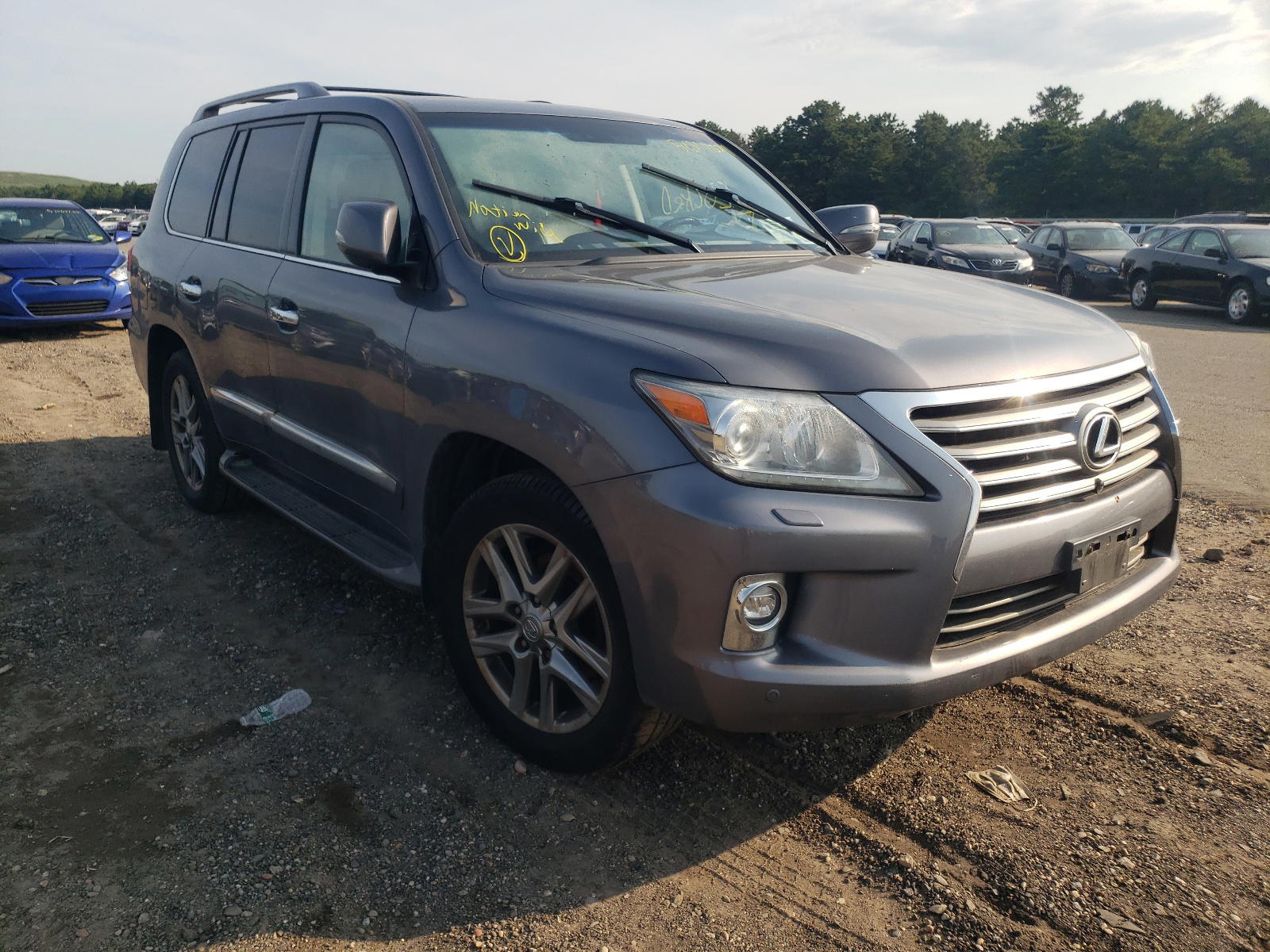 LEXUS LX 570 2015 with VIN JTJHY7AX2F4173582 - Photo from auction