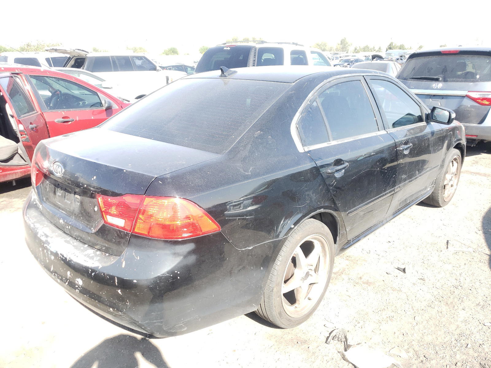 Photo 4 from auction – 2010 KIA OPTIMA LX with VIN KNAGG4A89A5408231