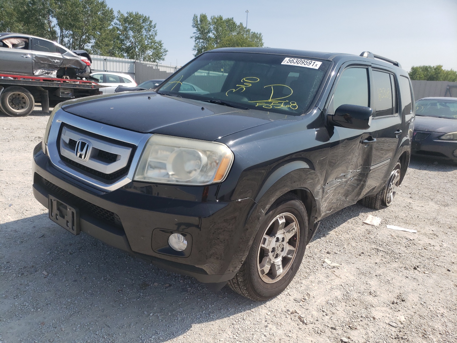 Photo 2 from auction – 2010 HONDA PILOT TOUR with VIN 5FNYF4H92AB005568