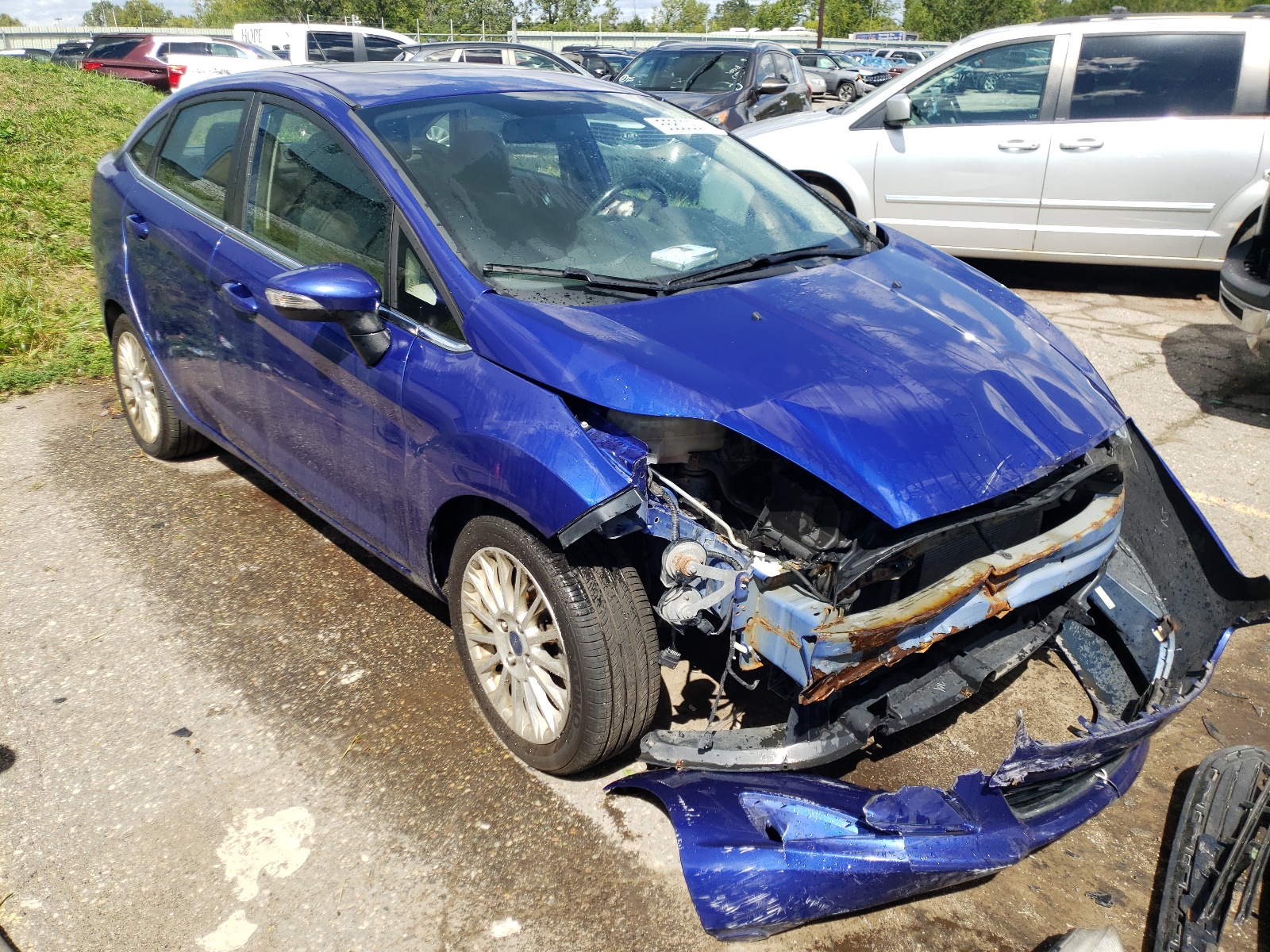 FORD FIESTA TIT 2014 with VIN 3FADP4CJ1EM220251 - Photo from auction