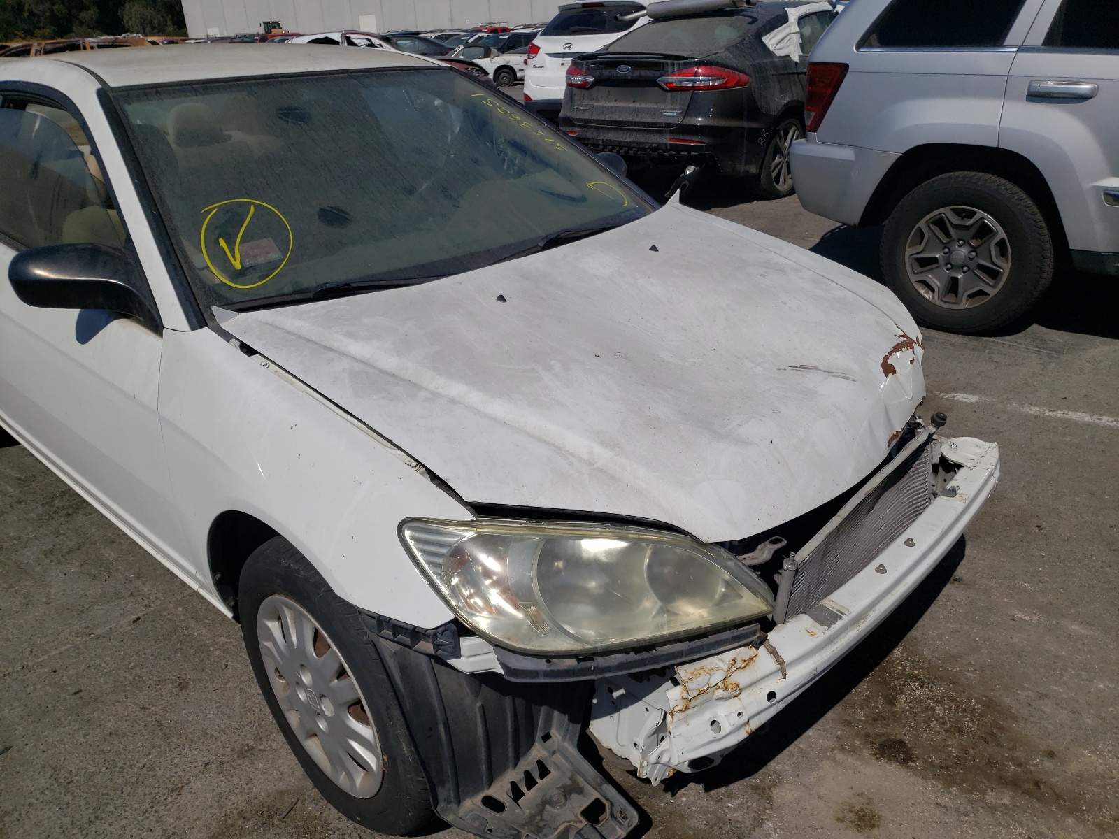 Photo 9 from auction – 2004 HONDA CIVIC LX with VIN 1HGEM22574L029905