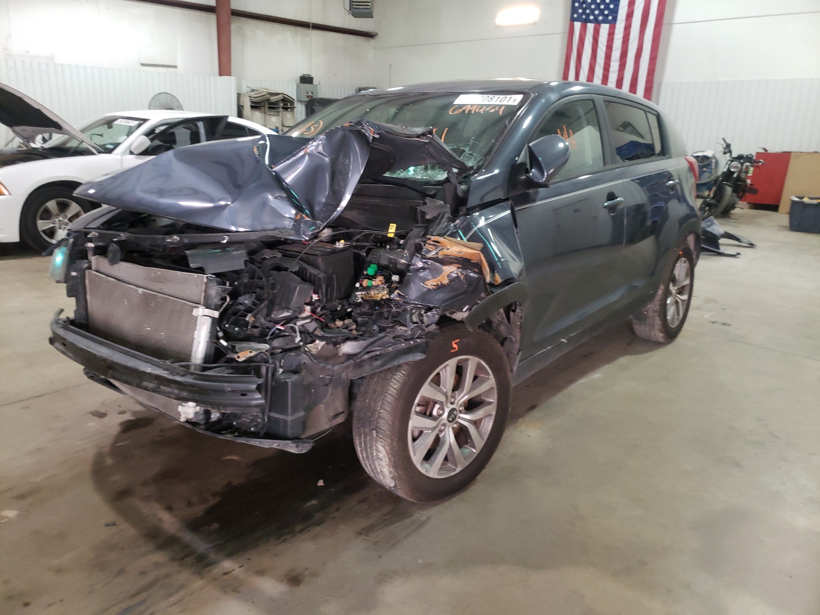 Photo 2 from auction – 2015 KIA SPORTAGE L with VIN KNDPB3AC9F7699454