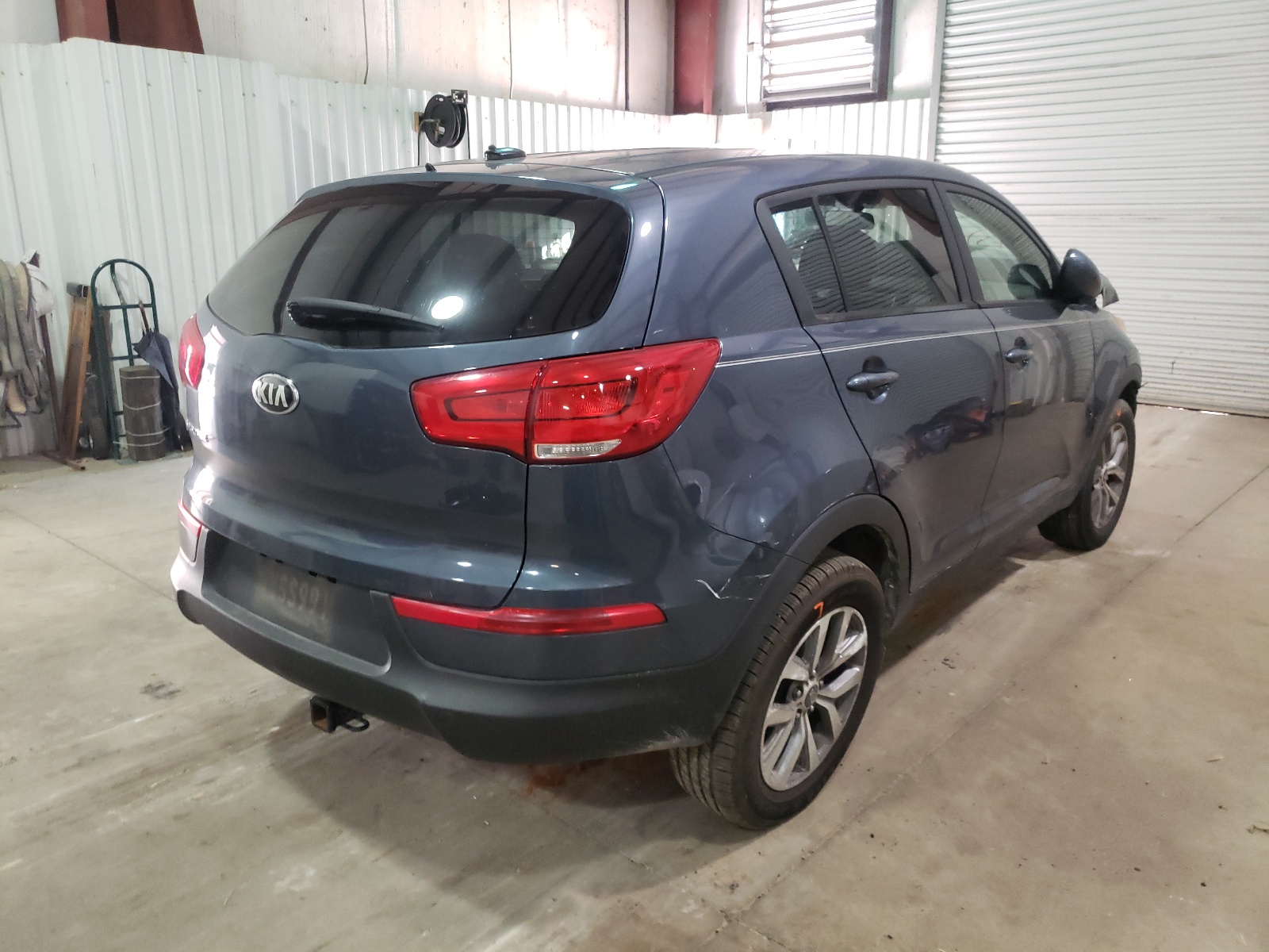 Photo 4 from auction – 2015 KIA SPORTAGE L with VIN KNDPB3AC9F7699454