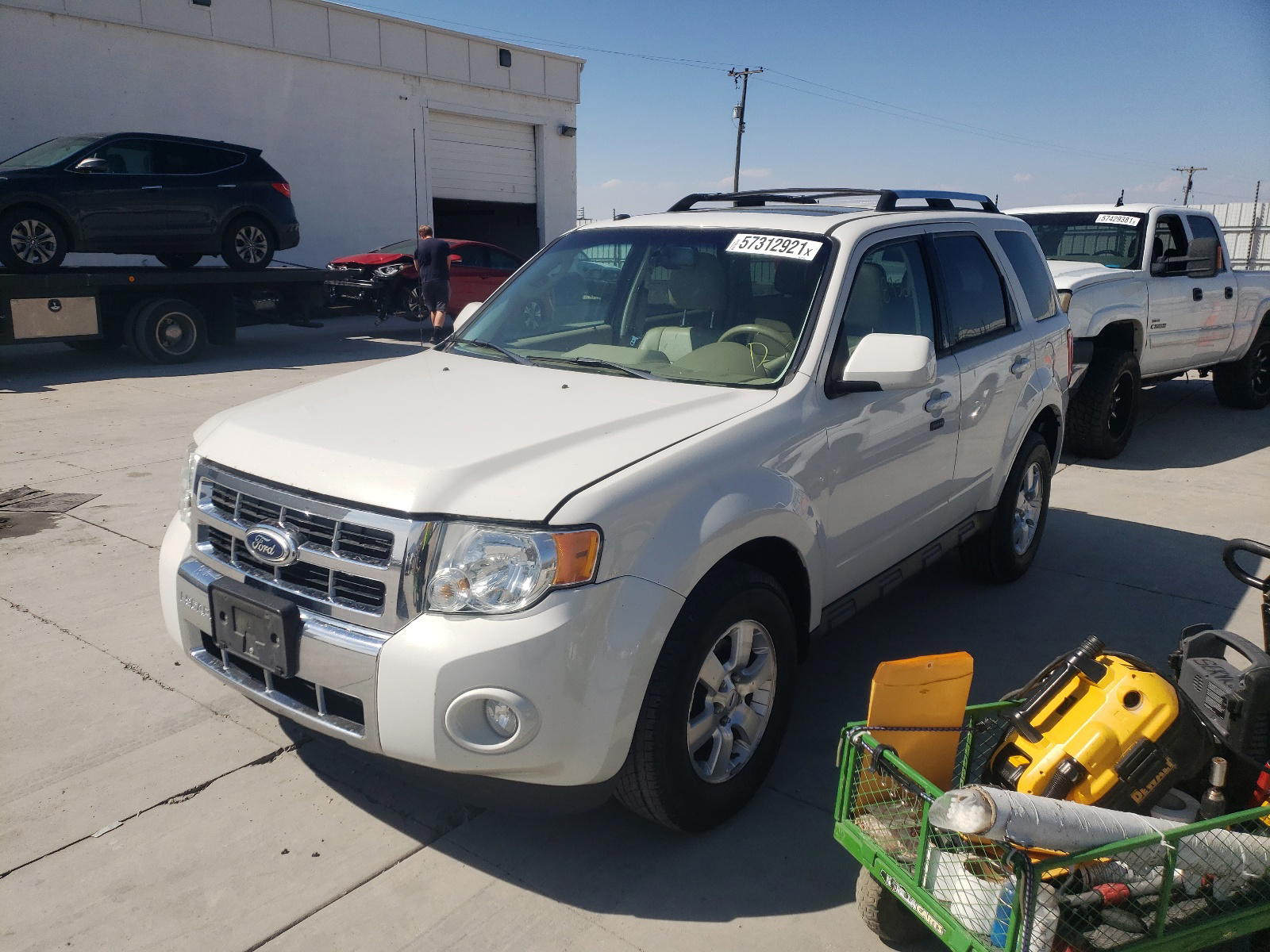 Photo 2 from auction – 2011 FORD ESCAPE LIM with VIN 1FMCU9E76BKA57396