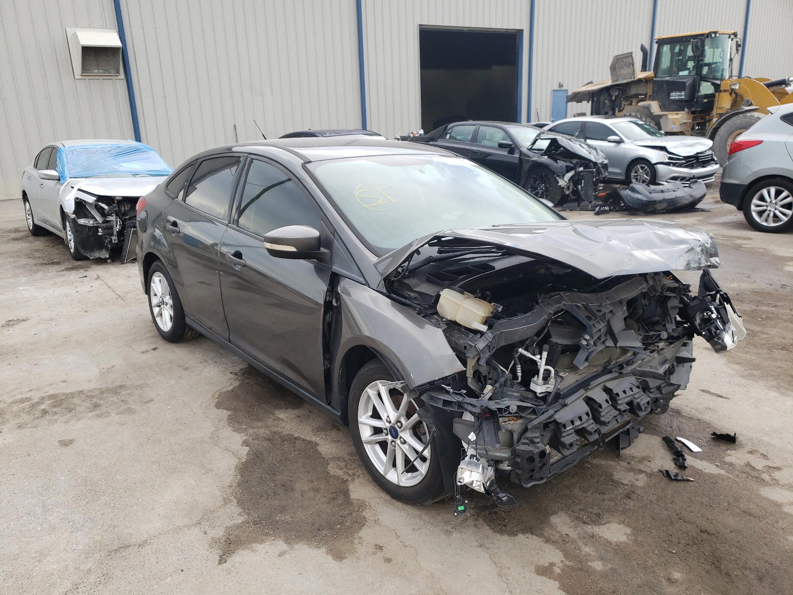FORD FOCUS SE 2015 with VIN 1FADP3F25FL379629 - Photo from auction