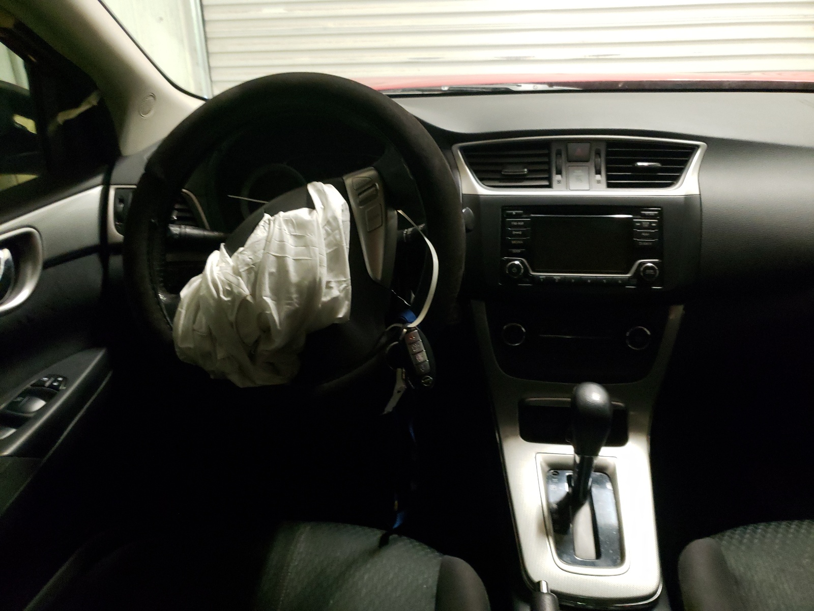 Photo 9 from auction – 2015 NISSAN SENTRA S with VIN 3N1AB7AP2FY229073