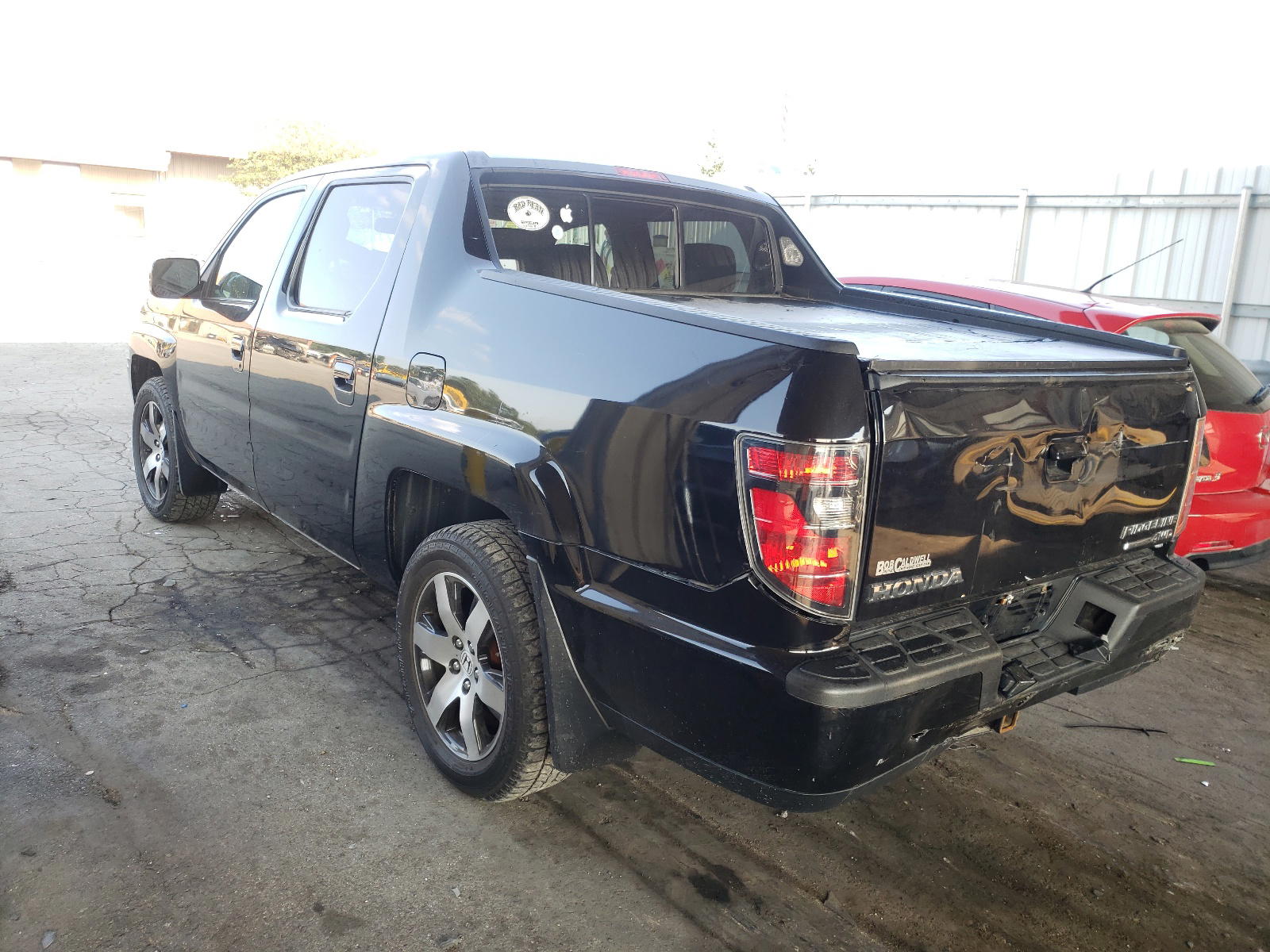 Photo 3 from auction – 2014 HONDA RIDGELINE with VIN 5FPYK1F61EB005786