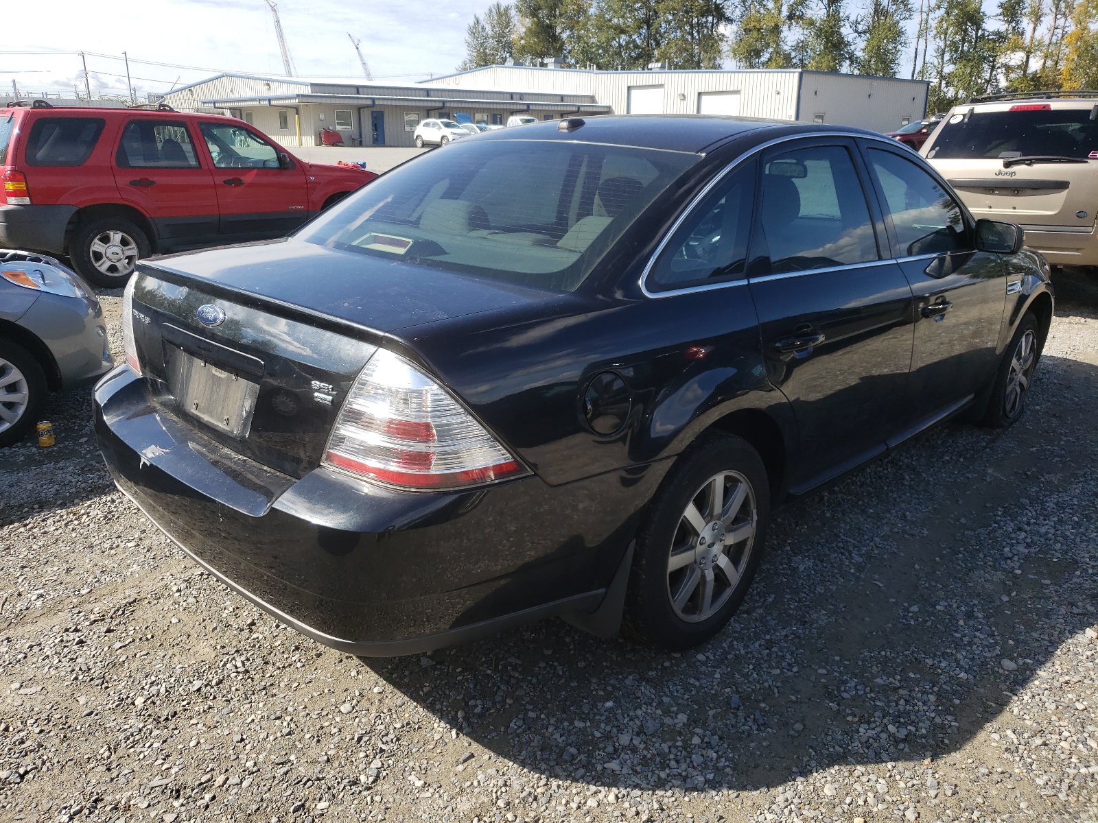 Photo 4 from auction – 2009 FORD TAURUS SEL with VIN 1FAHP27W49G103047