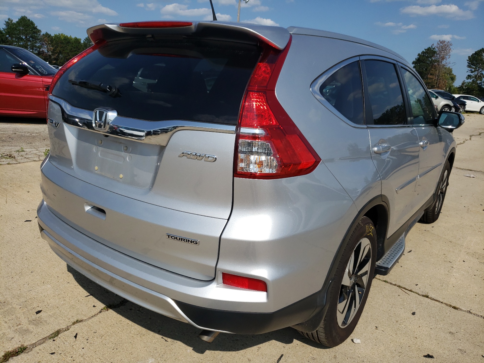 Photo 4 from auction – 2016 HONDA CR-V TOURI with VIN 5J6RM4H98GL075991