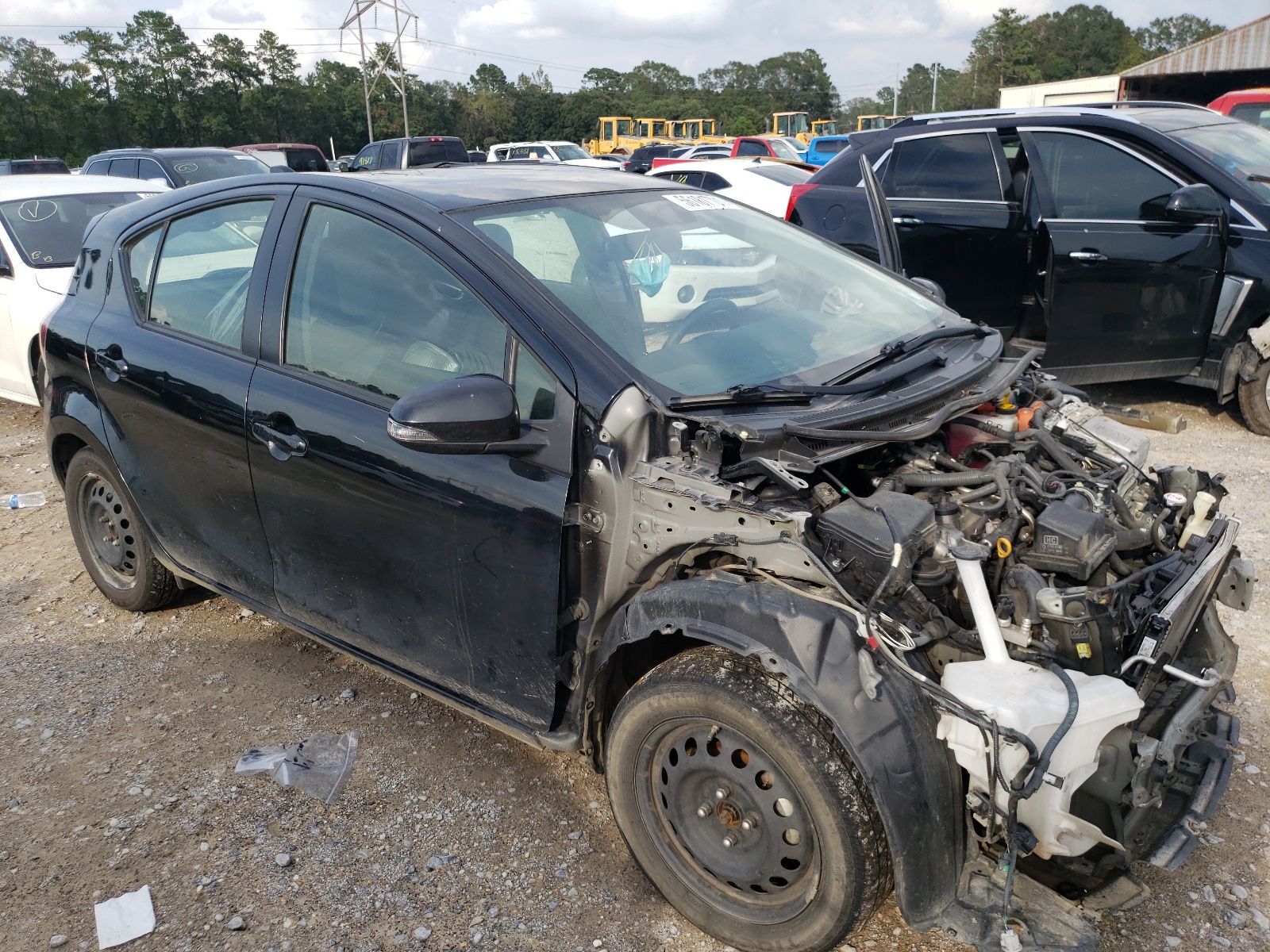 TOYOTA PRIUS C 2016 with VIN JTDKDTB35G1590433 - Photo from auction