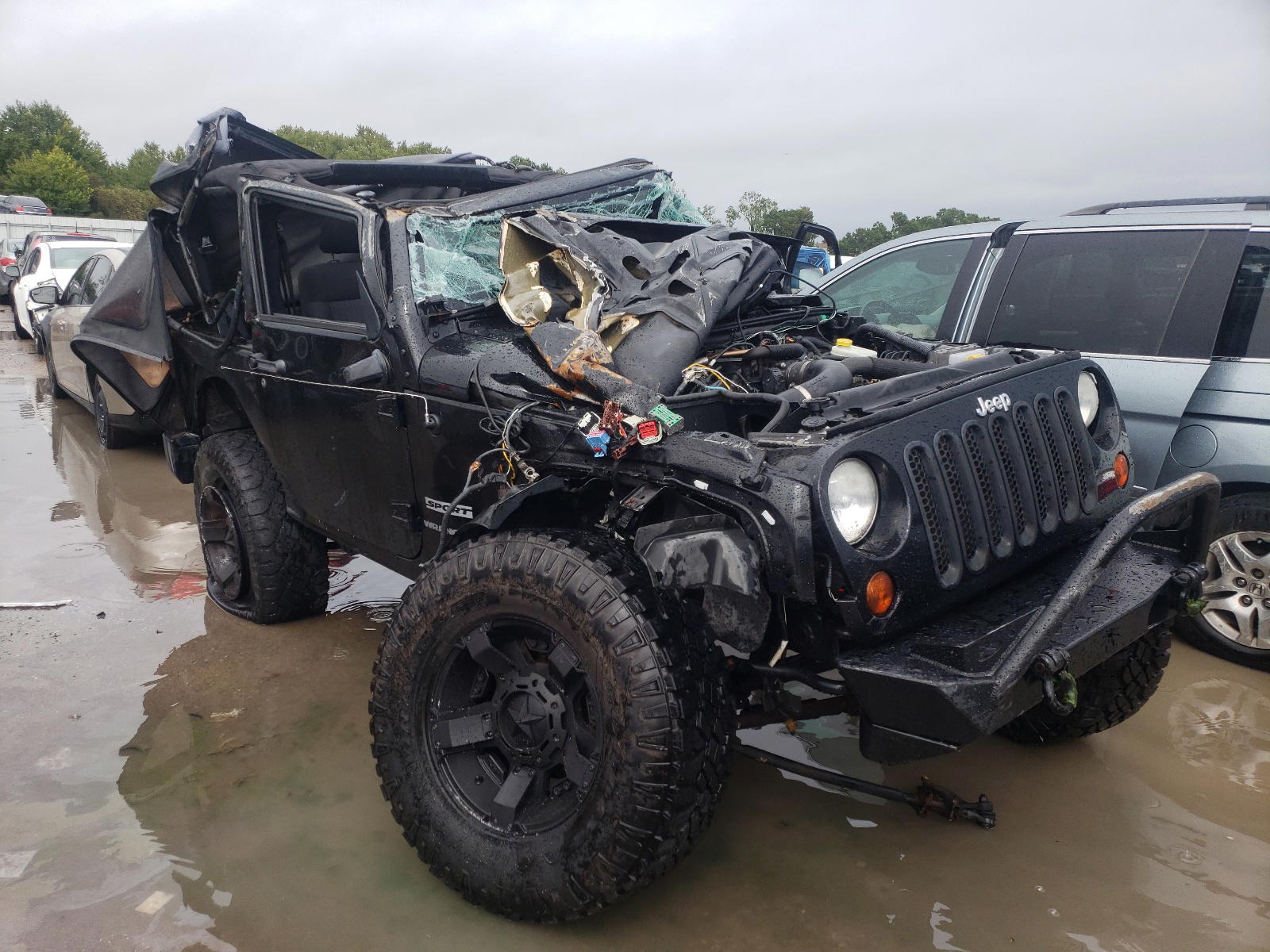 JEEP WRANGLER S 2011 with VIN 1J4AA2D14BL540690 - Photo from auction