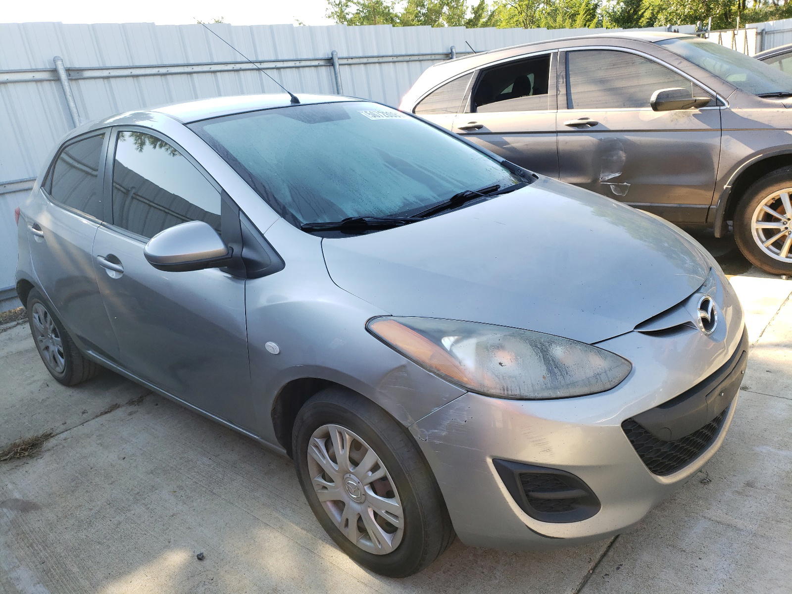 MAZDA MAZDA2 2012 with VIN JM1DE1KZ9C0142954 - Photo from auction